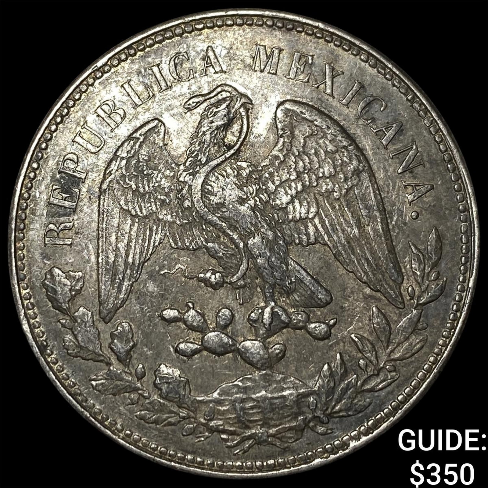 1900Mo Mexico Silver 1 Peso (1 of 2)