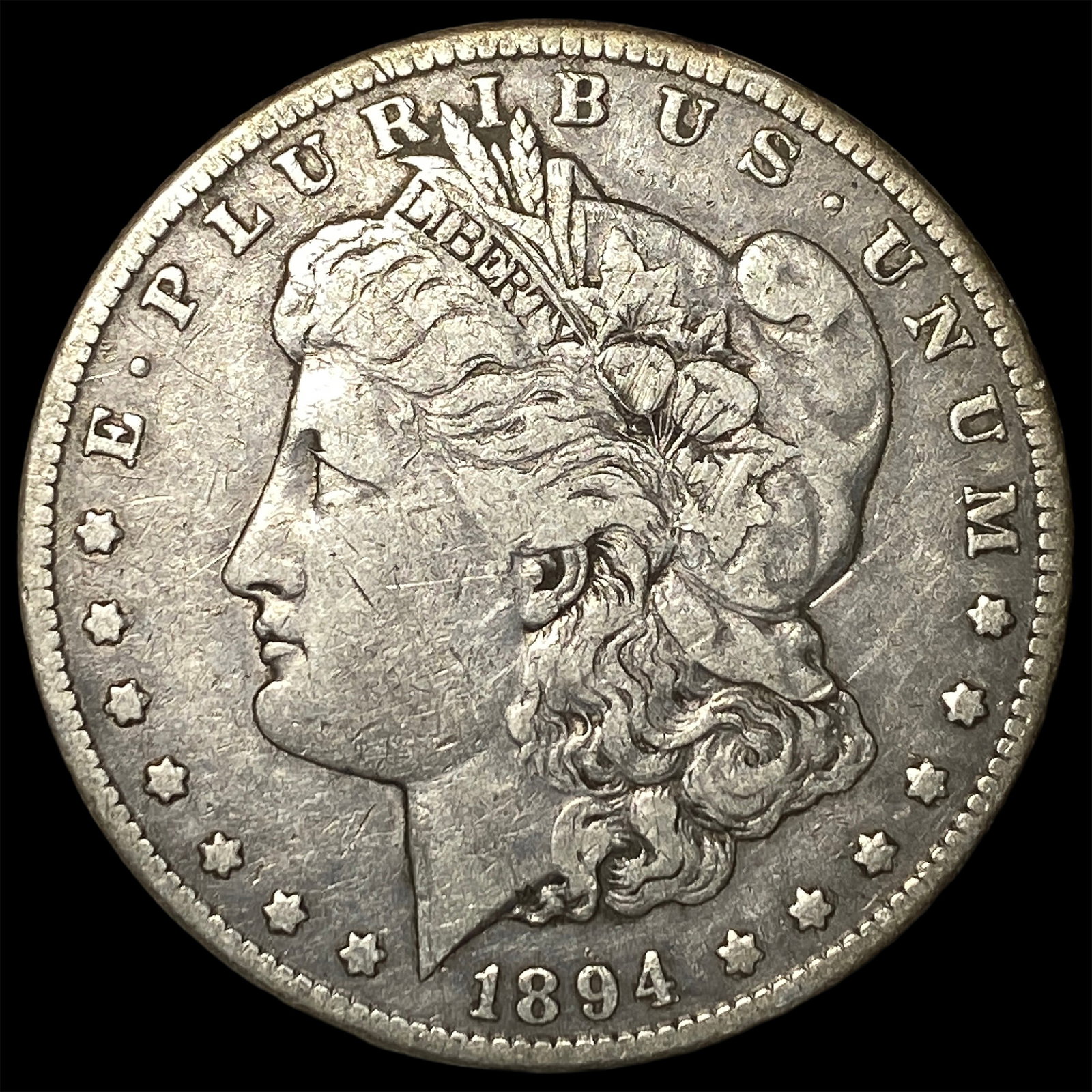 1894-S Silver Morgan Dollar ABOUT UNCIRCULATED: 1894-S Silver Morgan Dollar ABOUT UNCIRCULATED