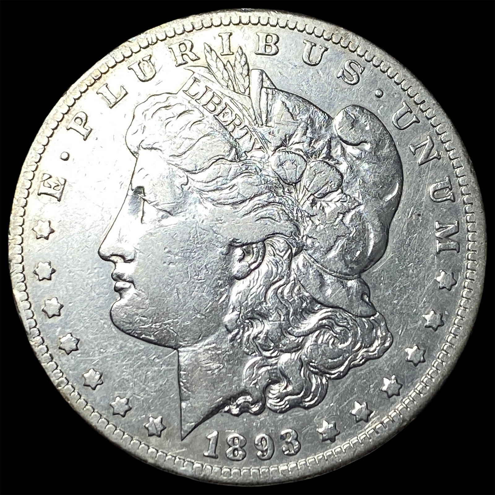 1893-CC Silver Morgan Dollar ABOUT UNCIRCULATED: 1893-CC Silver Morgan Dollar ABOUT UNCIRCULATED