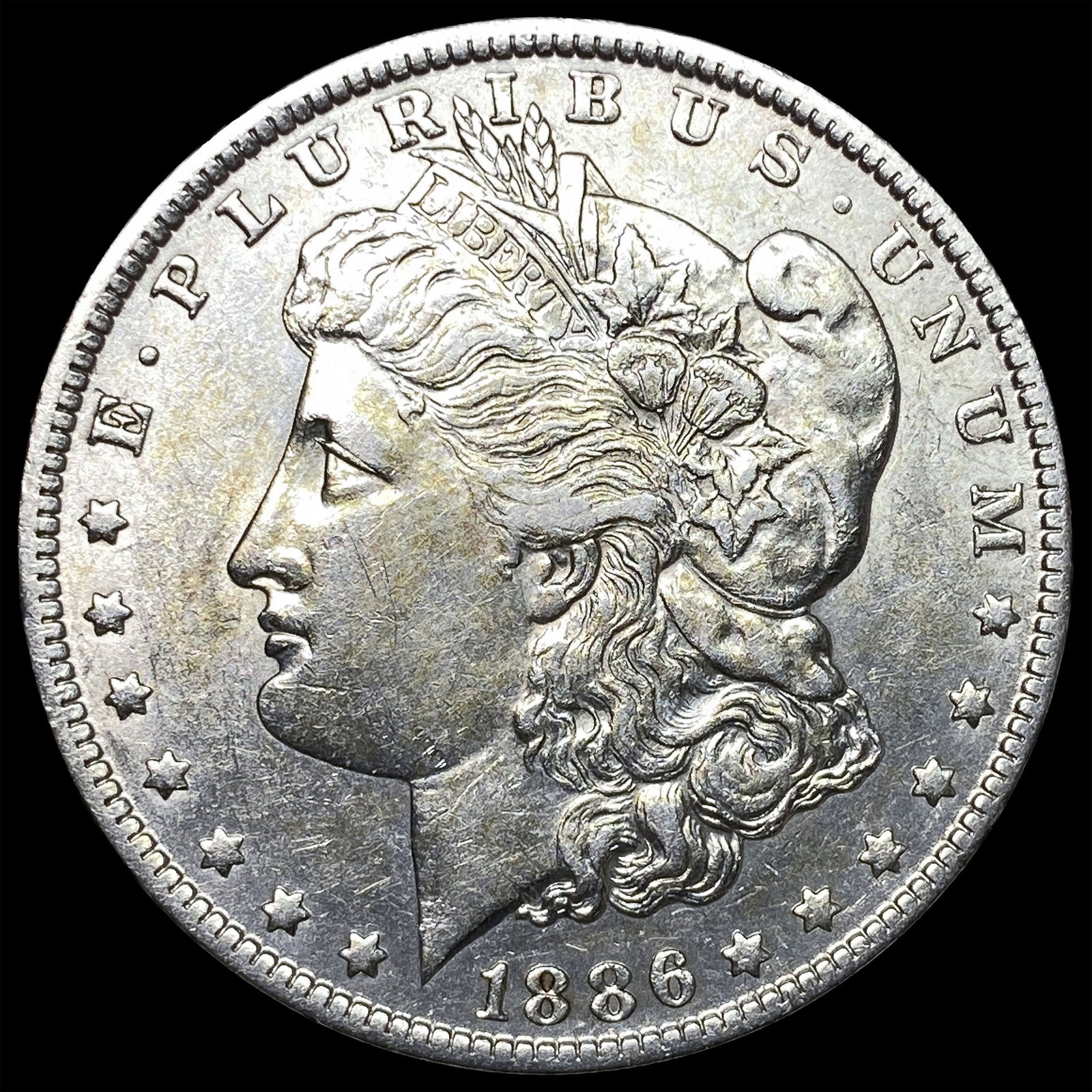 1886-O Silver Morgan Dollar CLOSELY UNCIRCULATED (1 of 2)