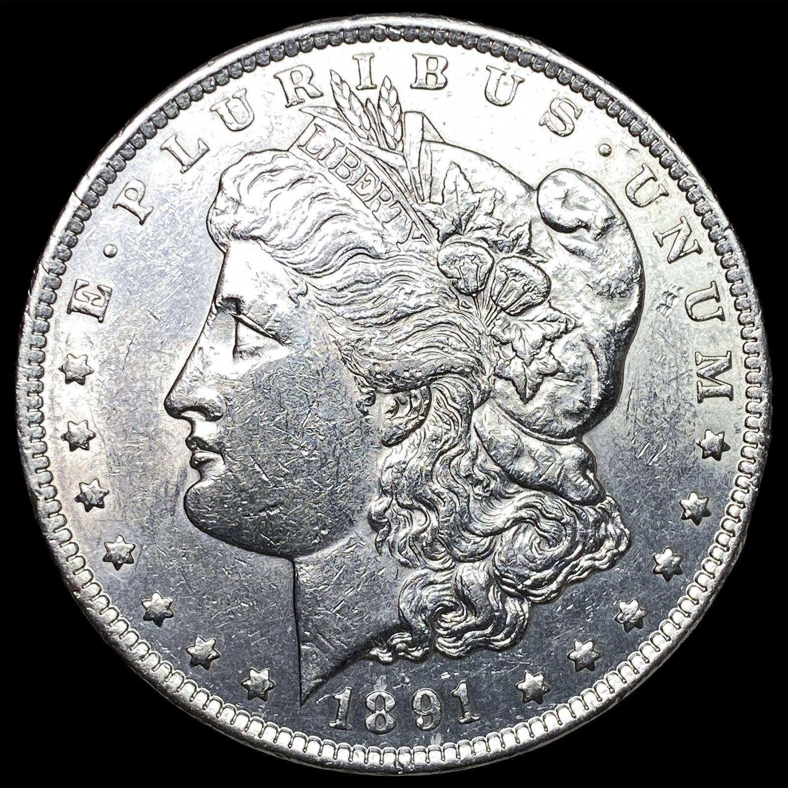 1891-CC Morgan Silver Dollar CLOSELY UNCIRCULATED: 1891-CC Morgan Silver Dollar CLOSELY UNCIRCULATED