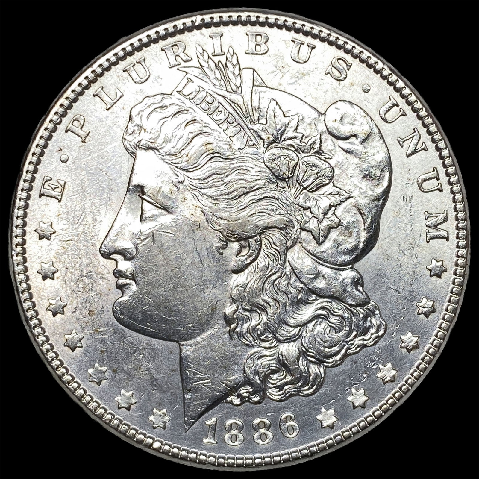 1886 Silver Morgan Dollar CLOSELY UNCIRCULATED: 1886 Silver Morgan Dollar CLOSELY UNCIRCULATED
