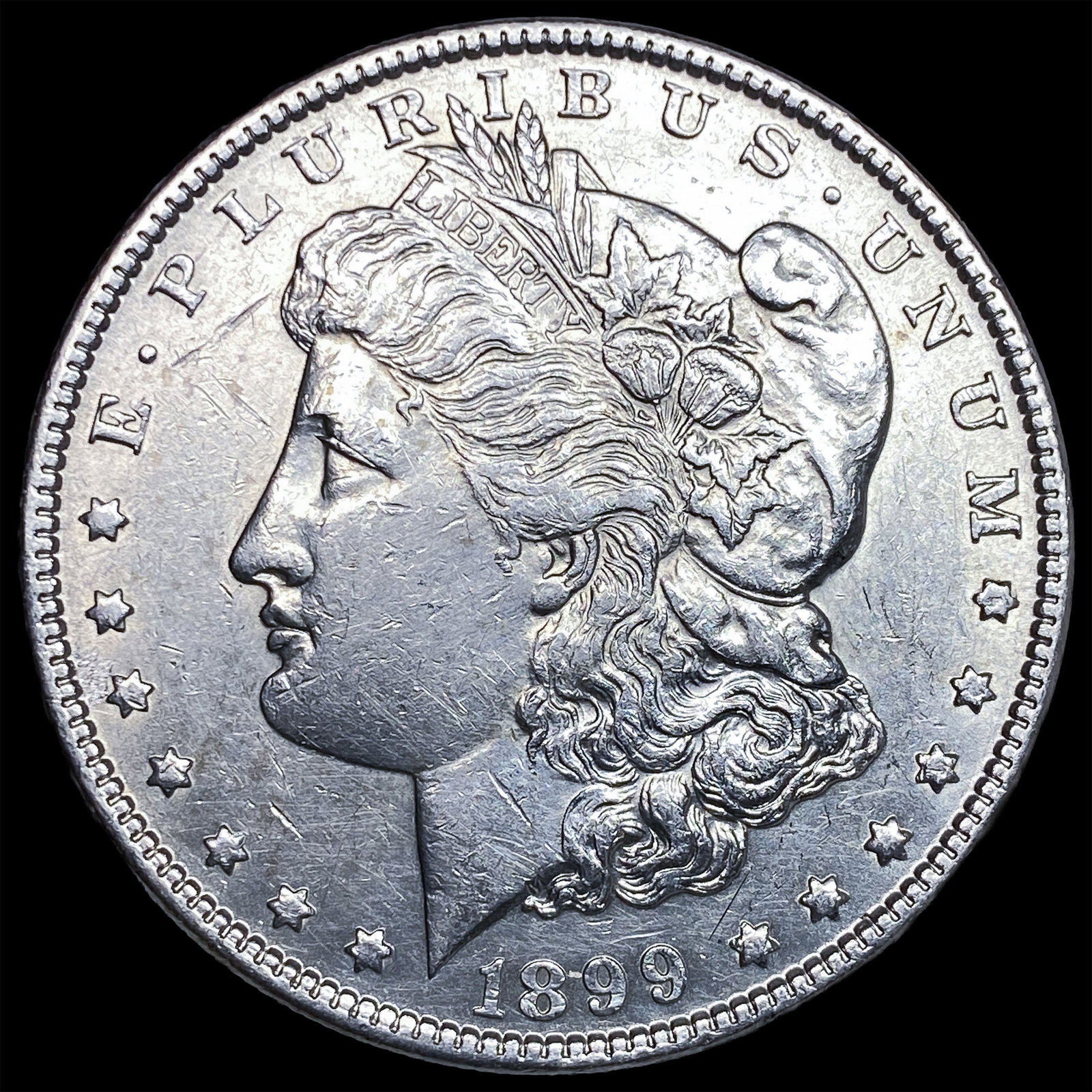 1899 Morgan Silver Dollar CLOSELY UNCIRCULATED (1 of 2)