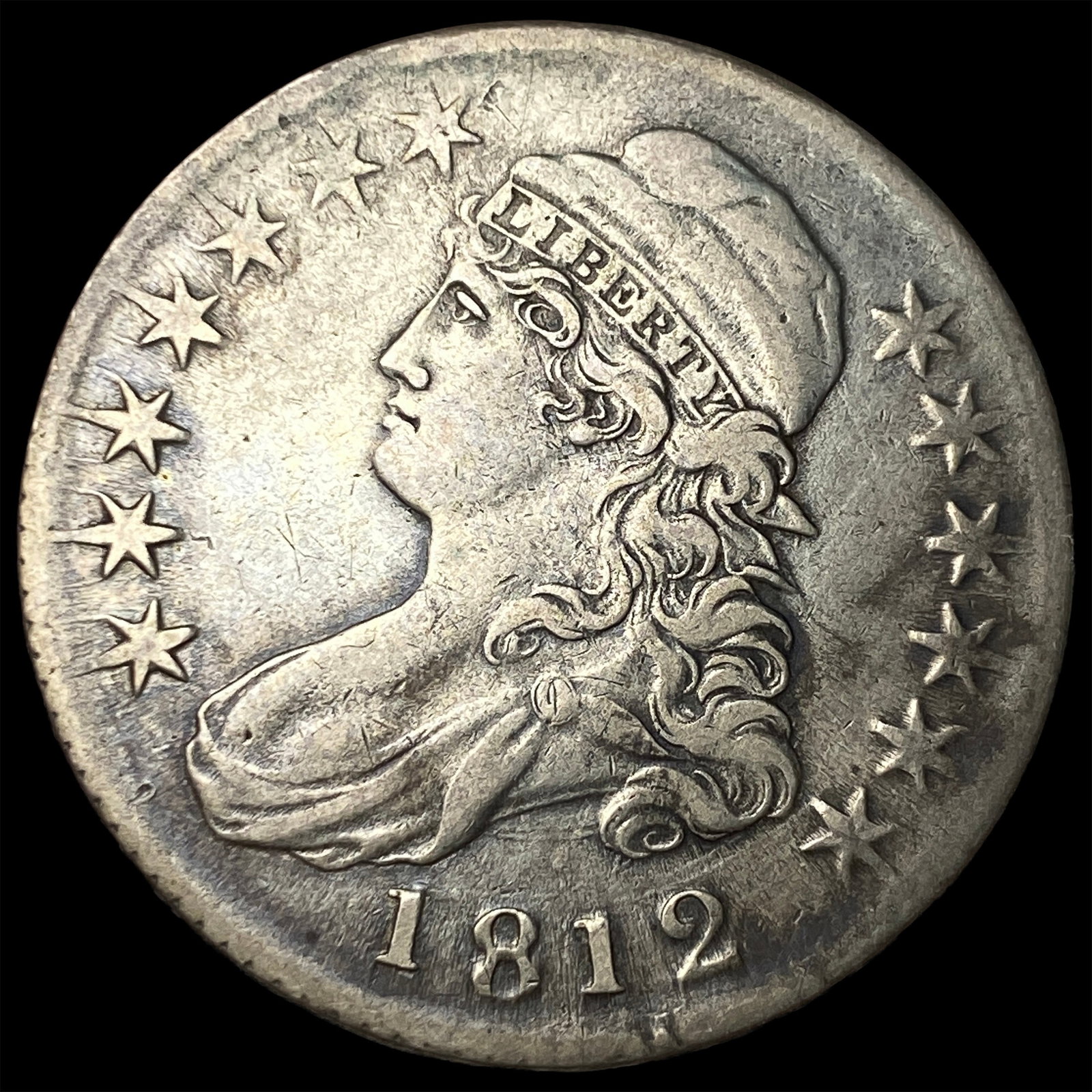 1812 Capped Bust Half Dollar NEARLY UNCIRCULATED (1 of 2)