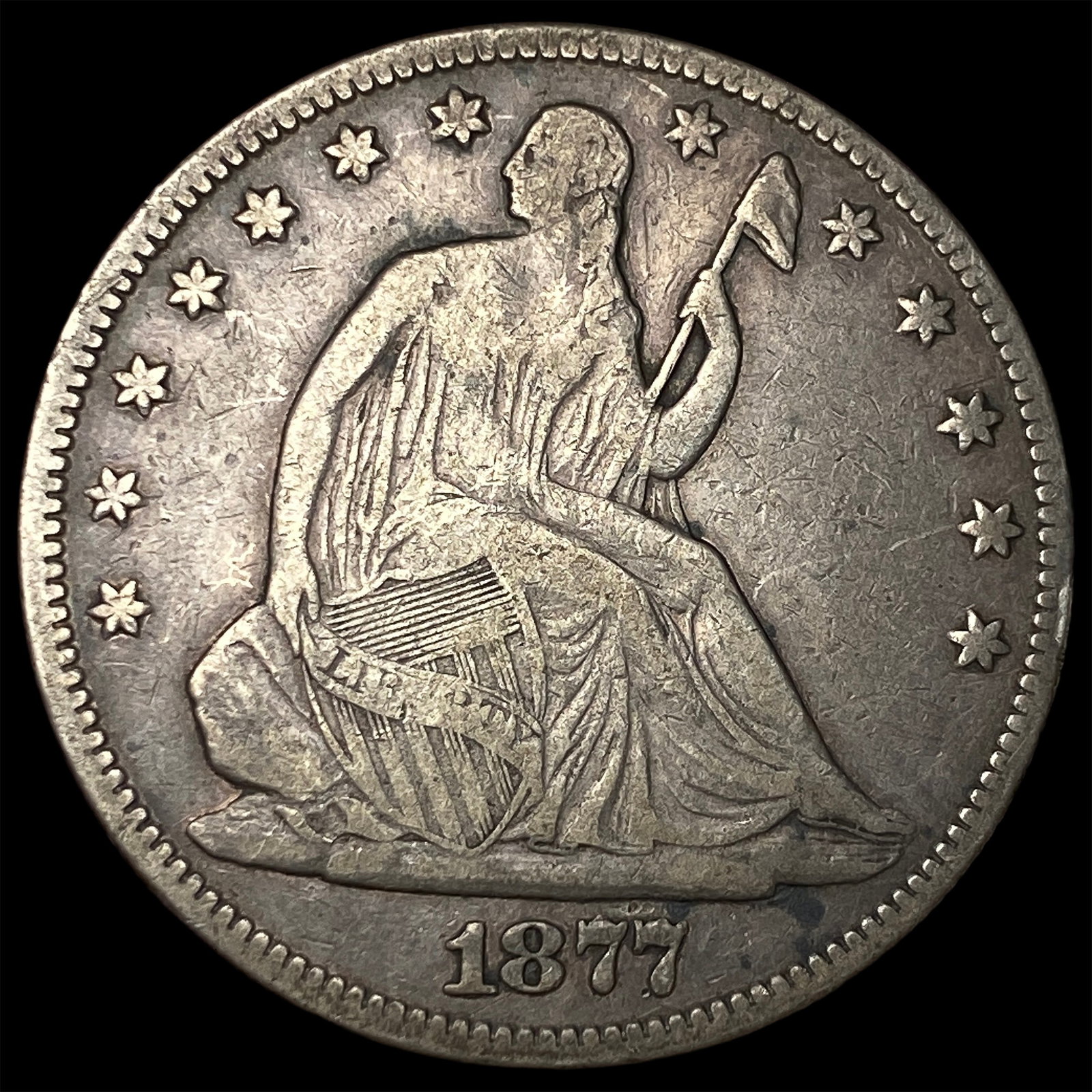 1877 Seated Liberty Half Dollar ABOUT UNCIRCULATED: 1877 Seated Liberty Half Dollar ABOUT UNCIRCULATED