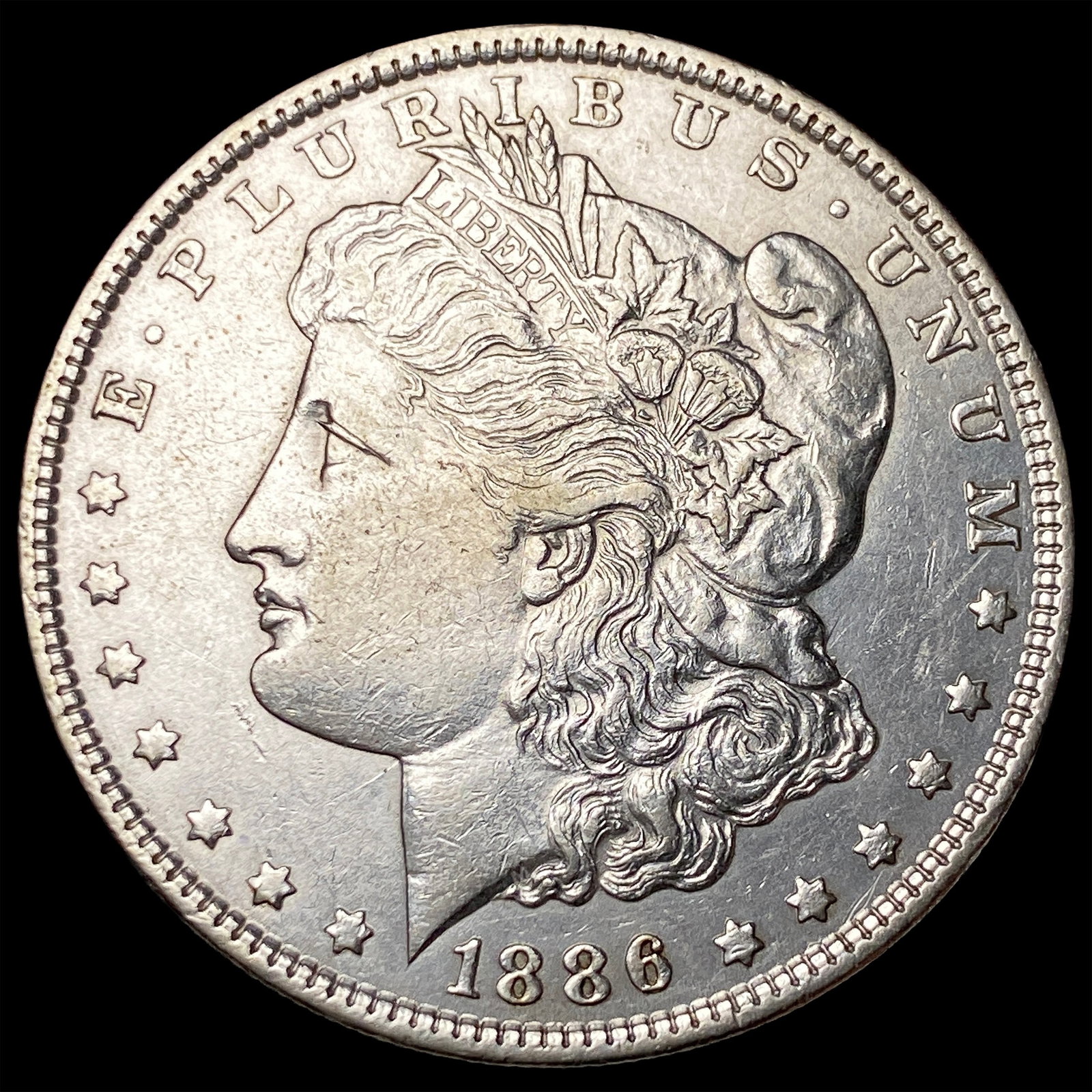 1886 Silver Morgan Dollar CLOSELY UNCIRCULATED: 1886 Silver Morgan Dollar CLOSELY UNCIRCULATED