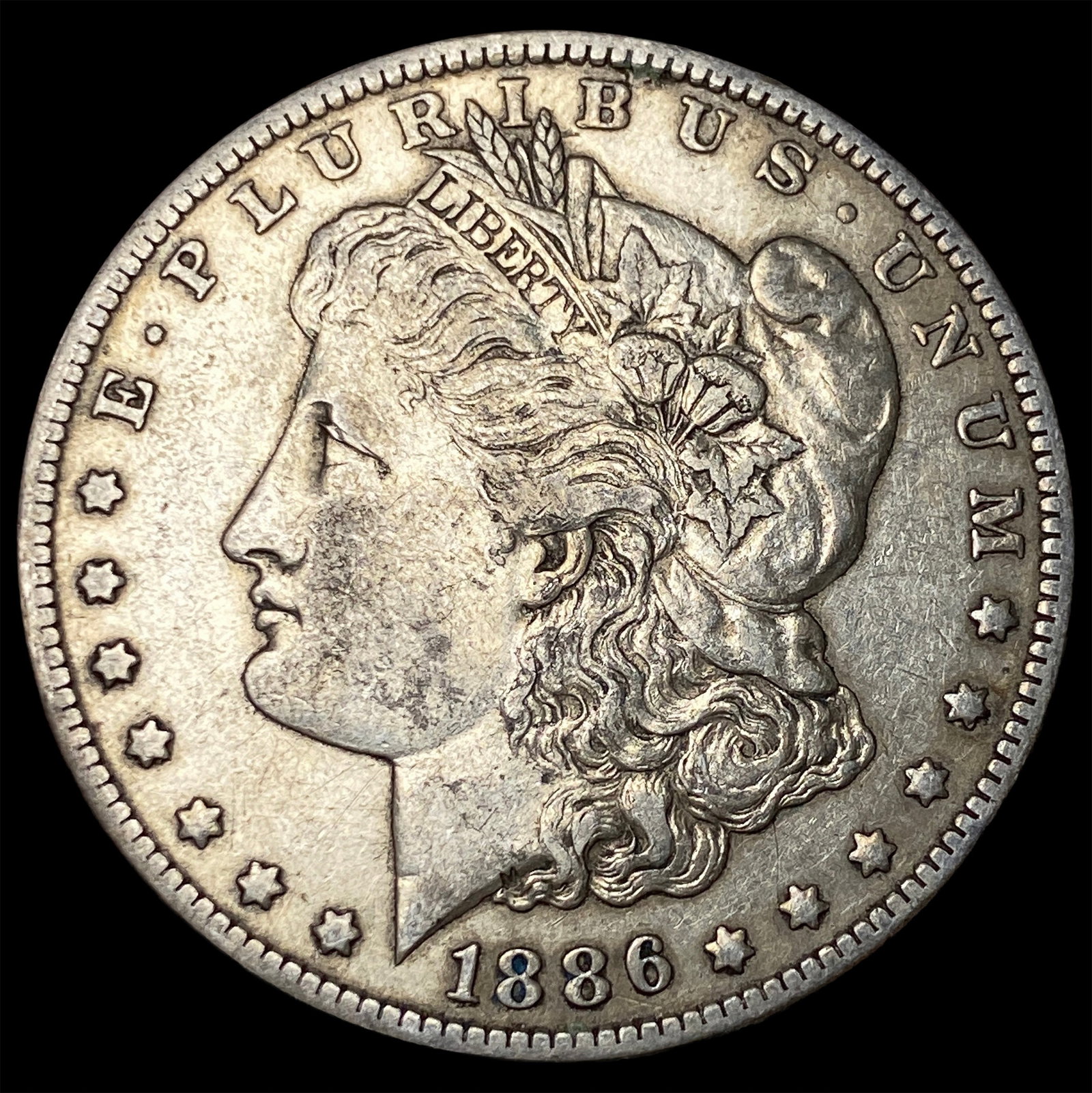 1886-O Silver Morgan Dollar NEARLY UNCIRCULATED: 1886-O Silver Morgan Dollar NEARLY UNCIRCULATED