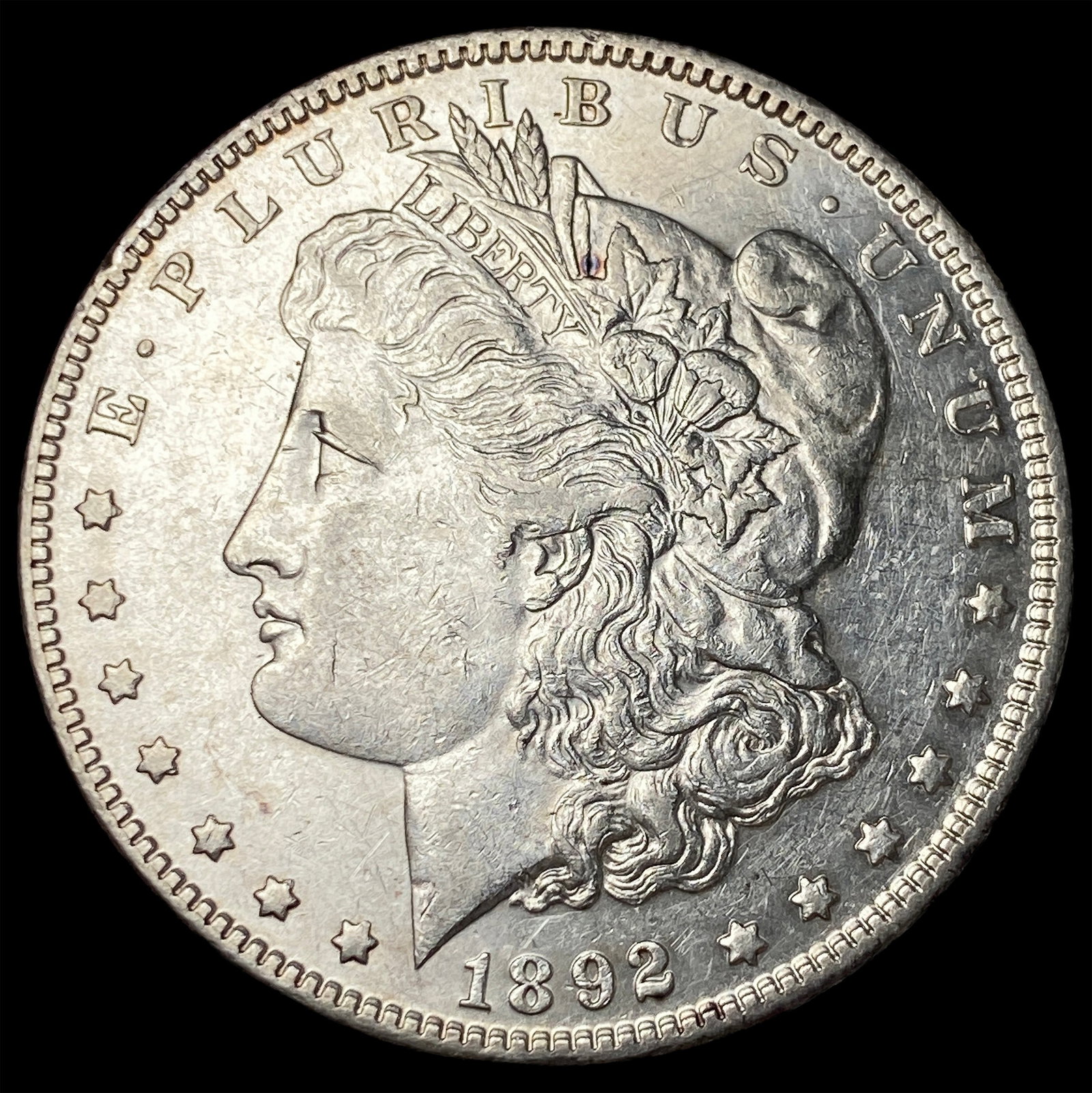 1892-CC Silver Morgan Dollar CLOSELY UNCIRCULATED: 1892-CC Silver Morgan Dollar CLOSELY UNCIRCULATED