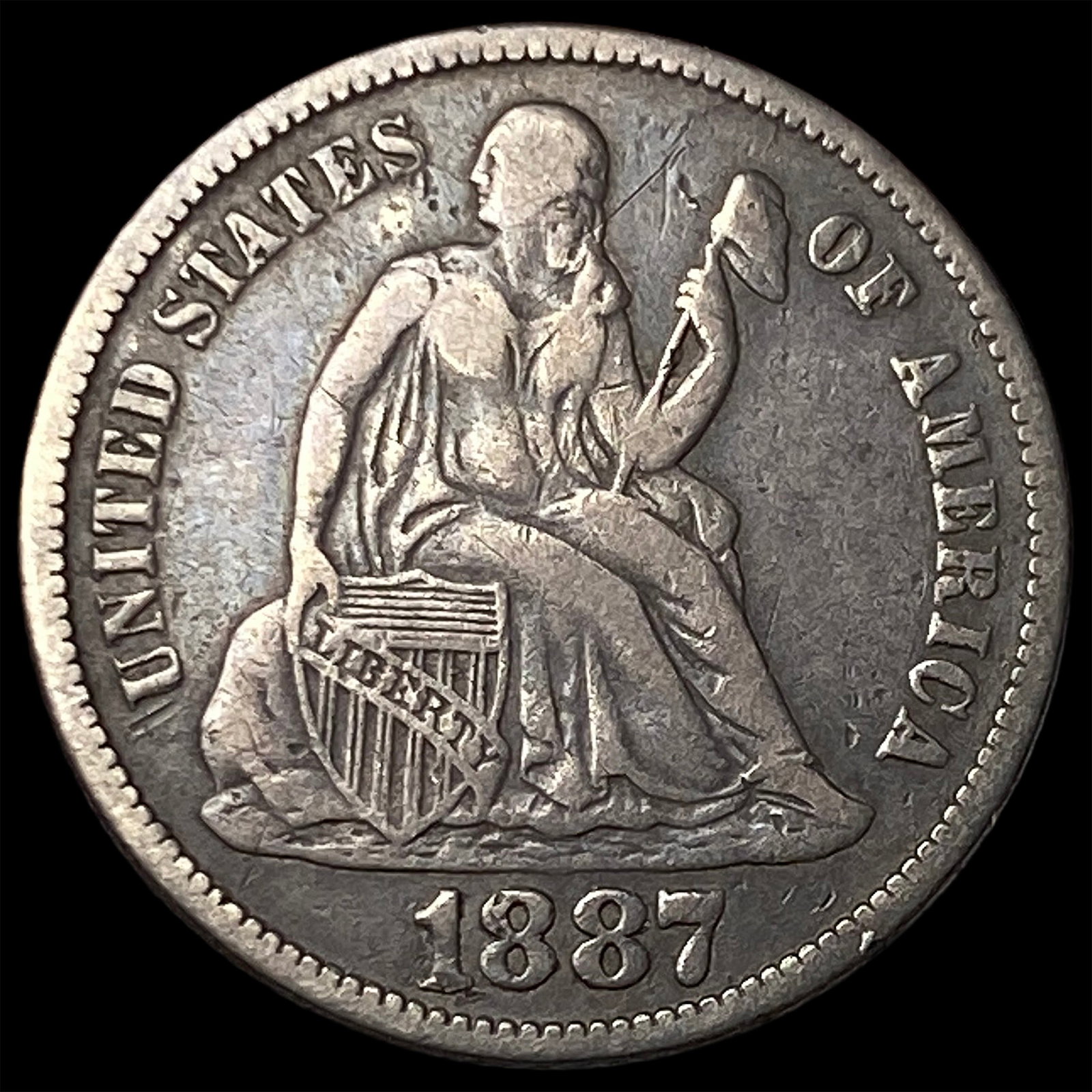 1887-S Silver Seated Liberty Dime NEARLY UNCIRCULATED: 1887-S Silver Seated Liberty Dime NEARLY UNCIRCULATED