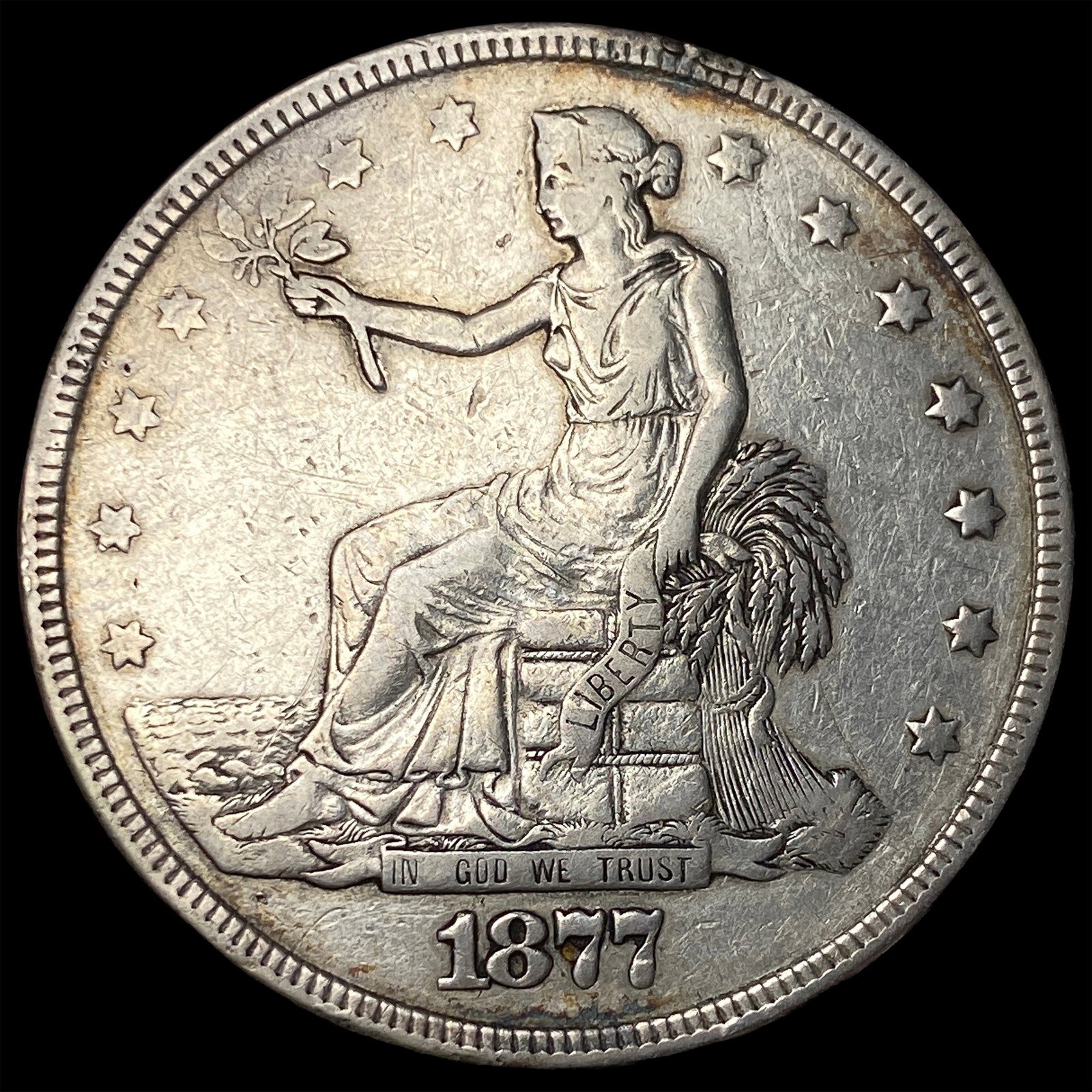 1877 Silver Trade Dollar ABOUT UNCIRCULATED: 1877 Silver Trade Dollar ABOUT UNCIRCULATED