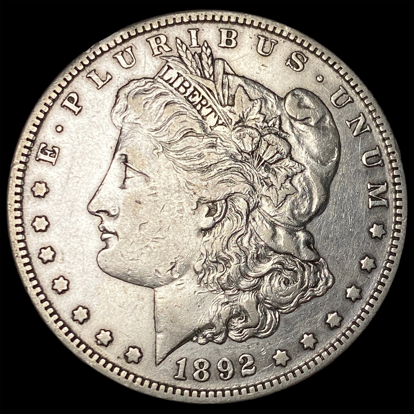 1892-S Silver Morgan Dollar NEARLY UNCIRCULATED (1 of 2)