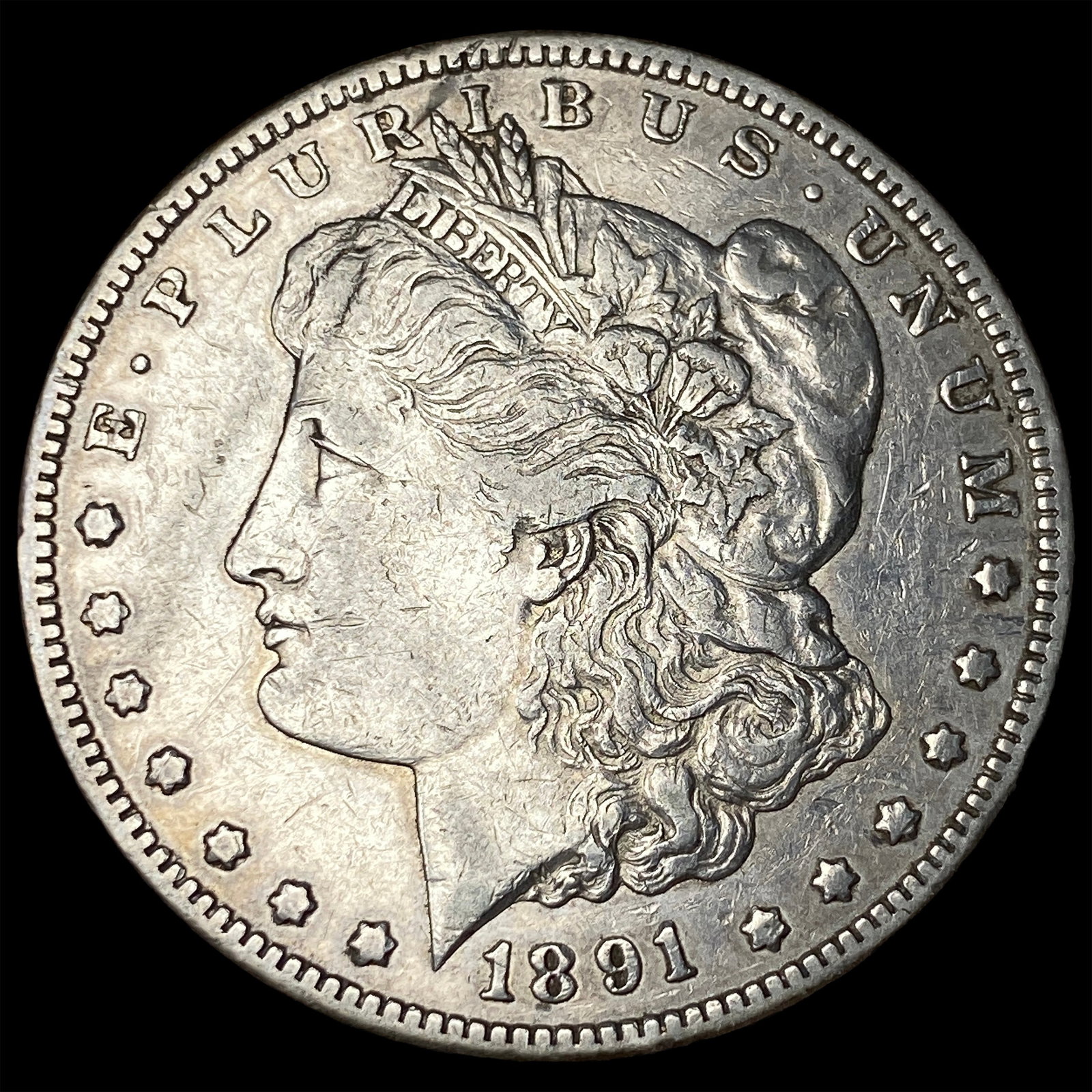 1891-CC Silver Morgan Dollar NEARLY UNCIRCULATED: 1891-CC Silver Morgan Dollar NEARLY UNCIRCULATED
