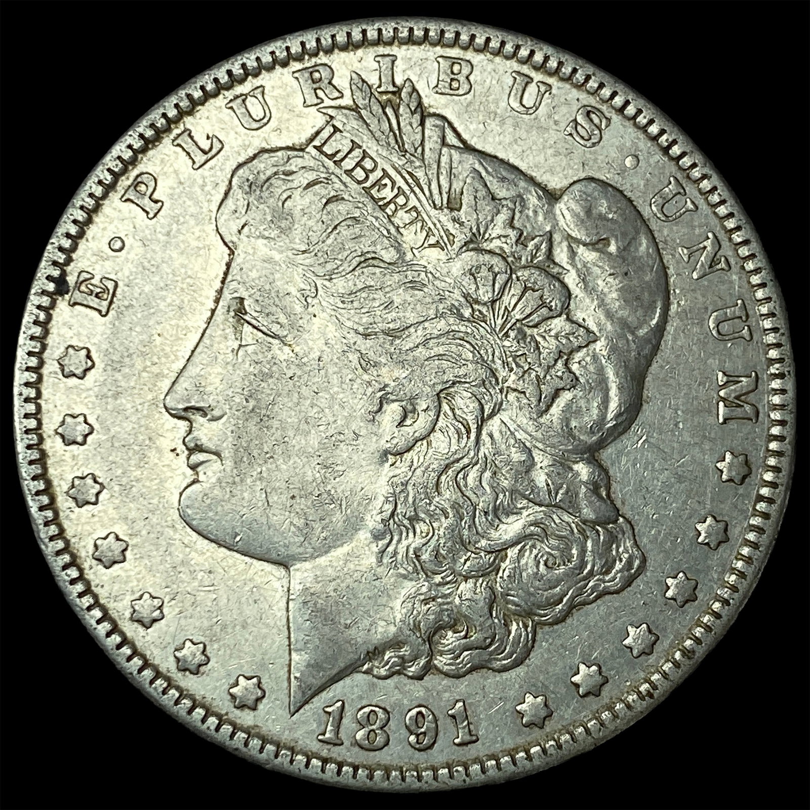 1891-CC Silver Morgan Dollar NEARLY UNCIRCULATED (1 of 2)