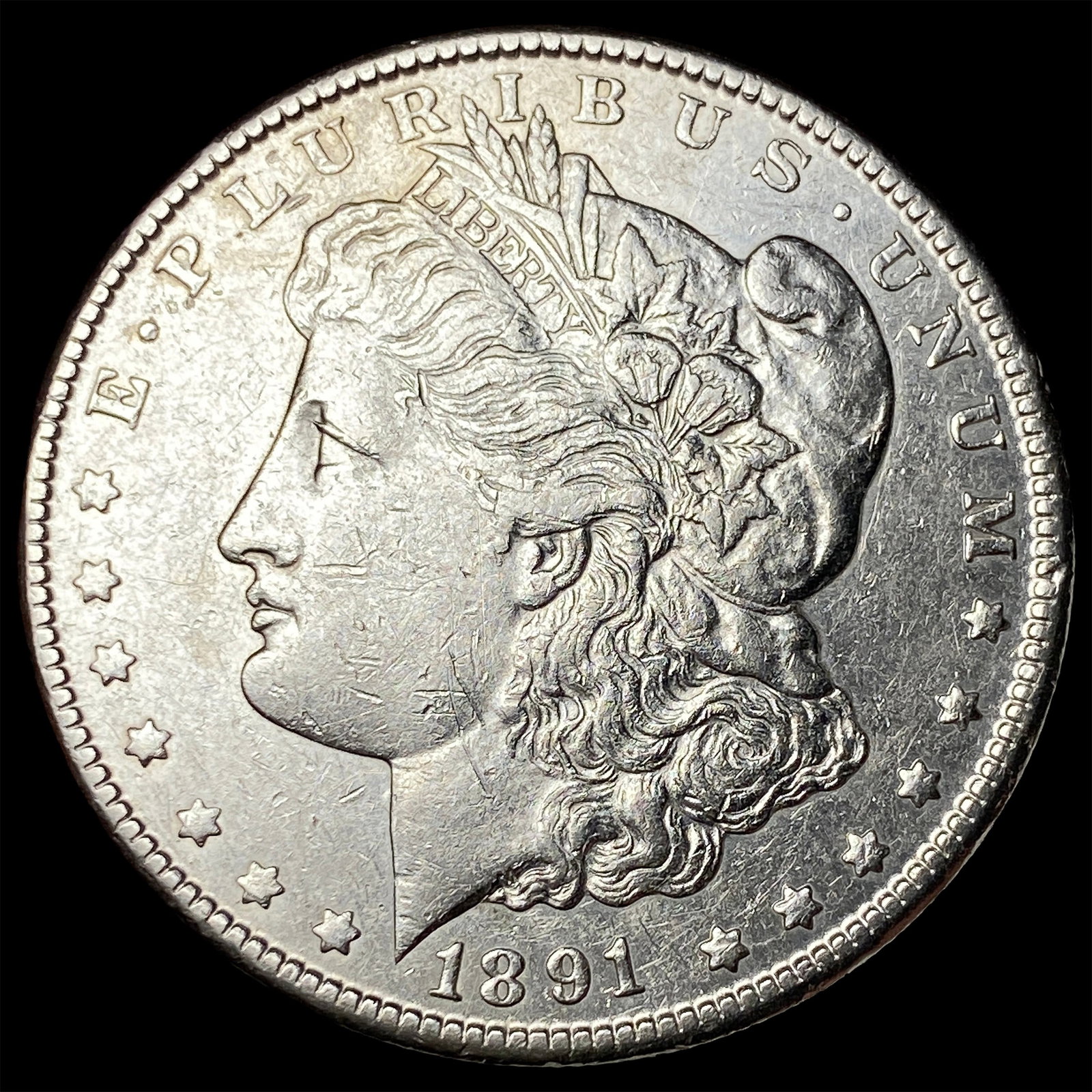 1891-CC Silver Morgan Dollar NEARLY UNCIRCULATED (1 of 2)