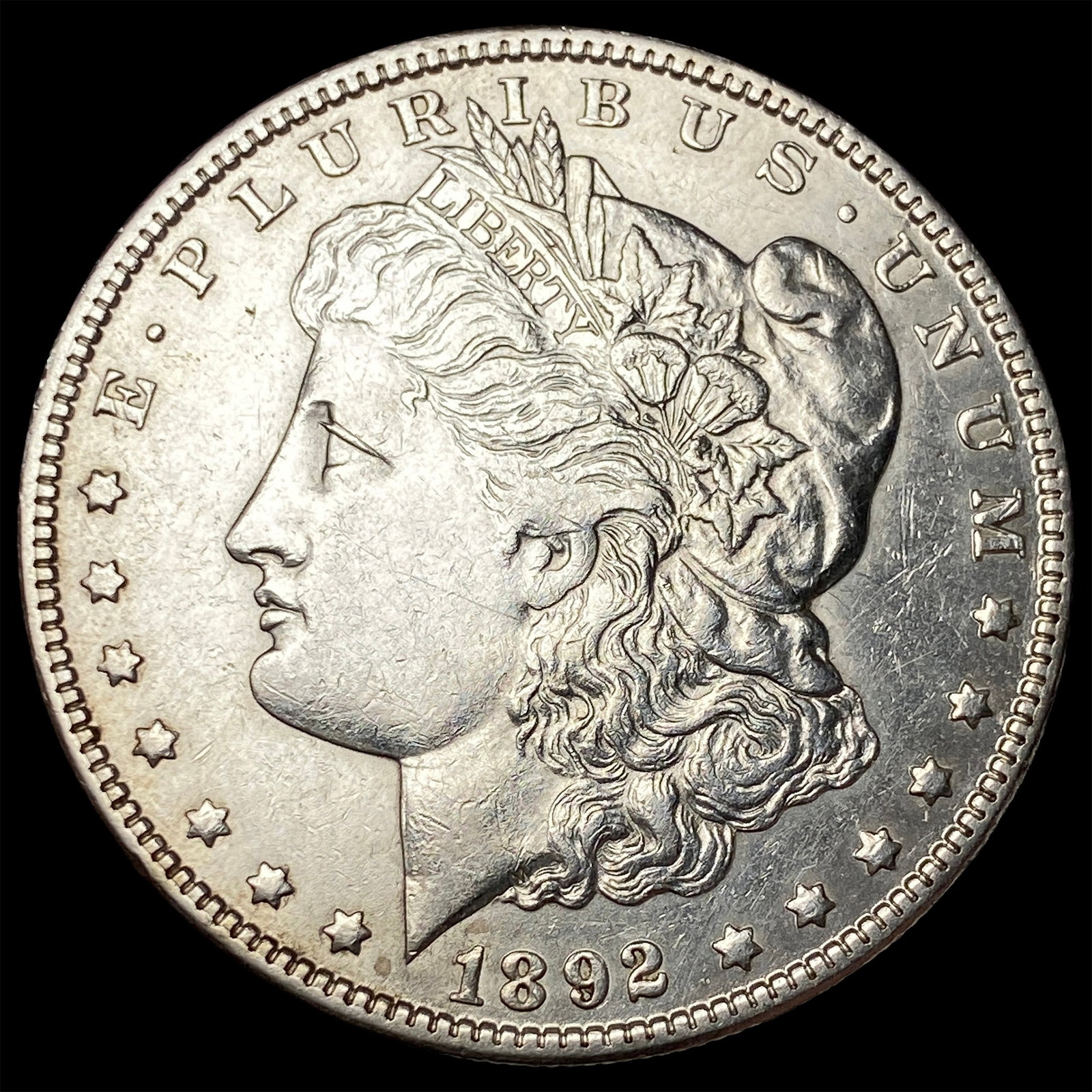 1892-O Silver Morgan Dollar NEARLY UNCIRCULATED (1 of 2)