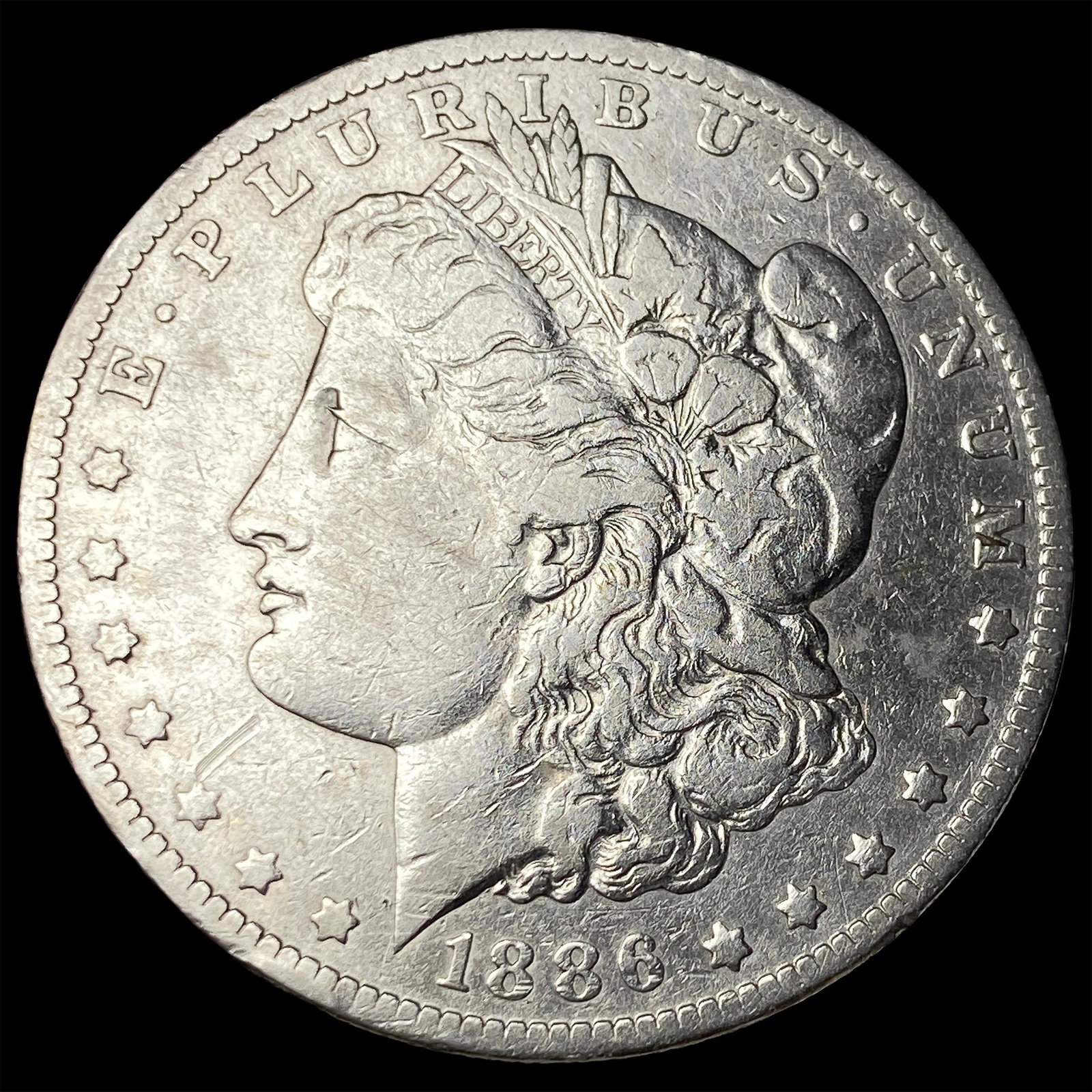 1886-O Silver Morgan Dollar ABOUT UNCIRCULATED: 1886-O Silver Morgan Dollar ABOUT UNCIRCULATED