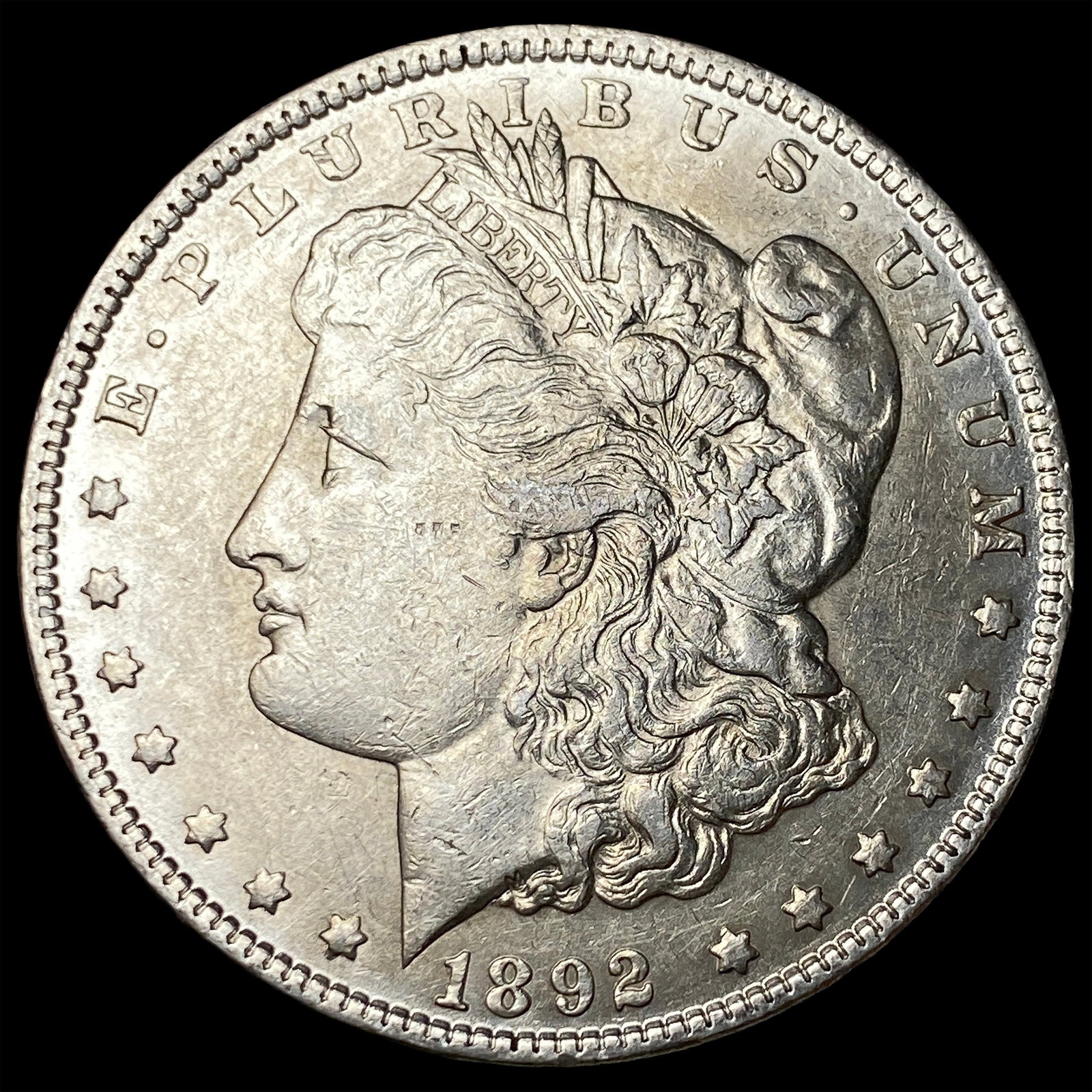 1892-CC Silver Morgan Dollar CLOSELY UNCIRCULATED: 1892-CC Silver Morgan Dollar CLOSELY UNCIRCULATED