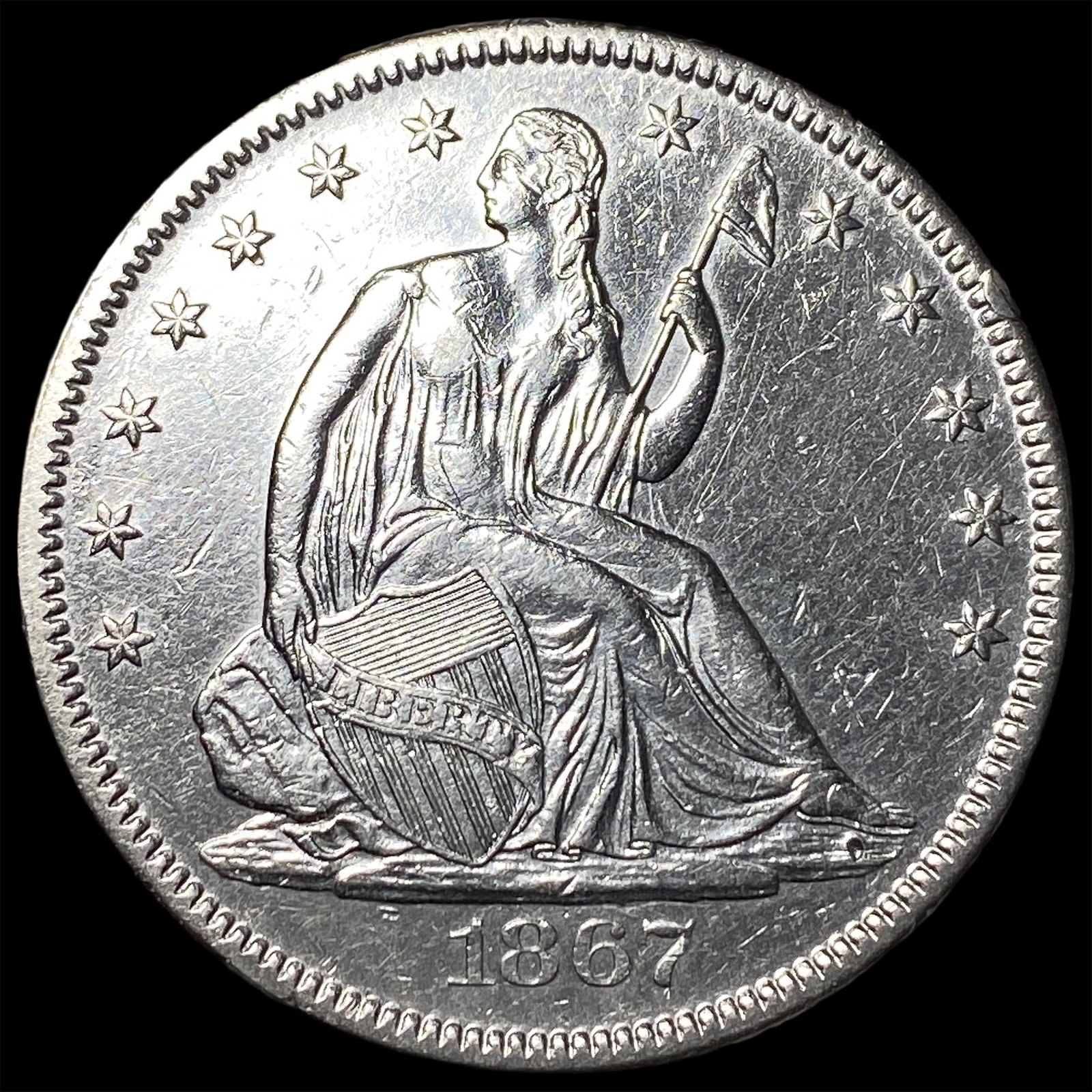 1867 Seated Liberty Half Dollar UNCIRCULATED (1 of 2)