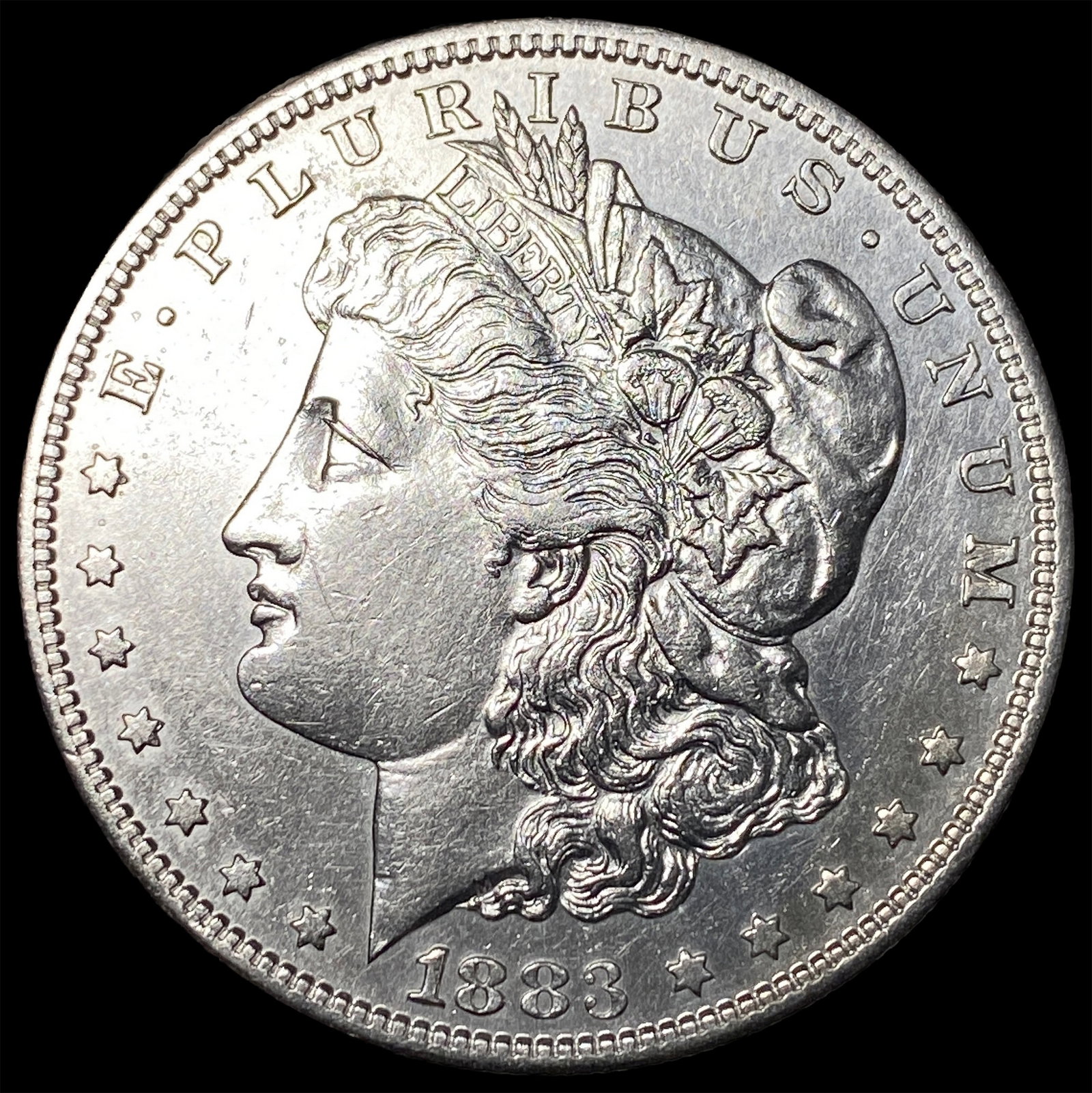 1883-S Silver Morgan Dollar ABOUT UNCIRCULATED: 1883-S Silver Morgan Dollar ABOUT UNCIRCULATED