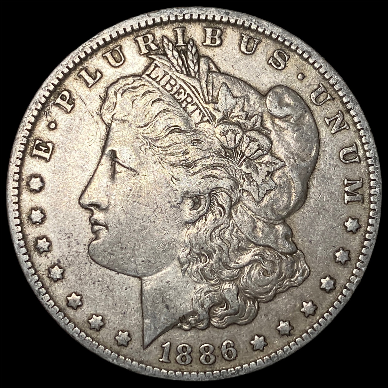1886-O Silver Morgan Dollar NEARLY UNCIRCULATED: 1886-O Silver Morgan Dollar NEARLY UNCIRCULATED