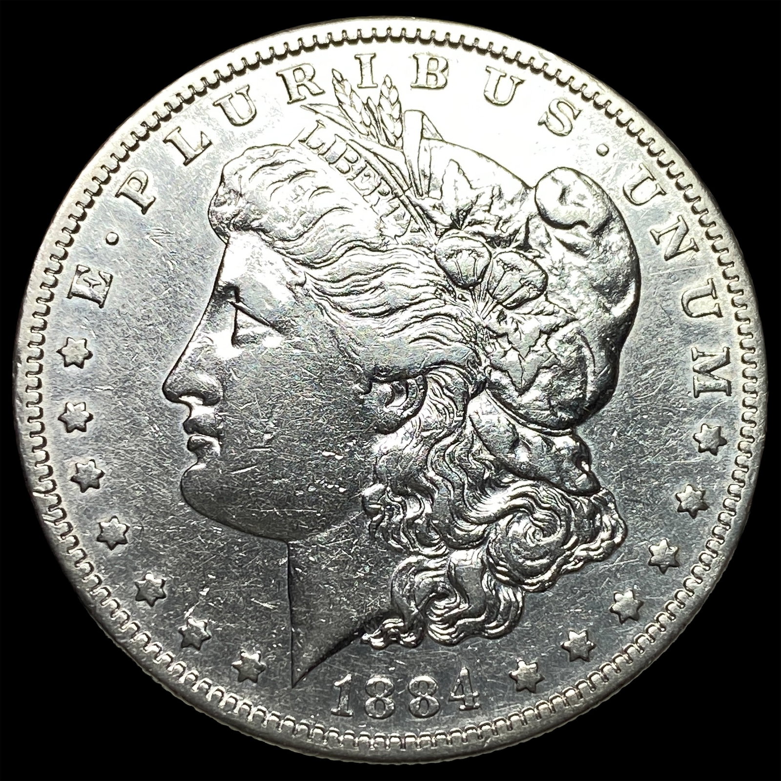 1884 Morgan Silver Dollar ABOUT UNCIRCULATED: 1884 Morgan Silver Dollar ABOUT UNCIRCULATED