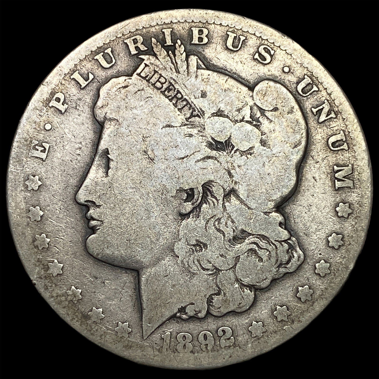 1892-CC Silver Morgan Dollar ABOUT UNCIRCULATED: 1892-CC Silver Morgan Dollar ABOUT UNCIRCULATED