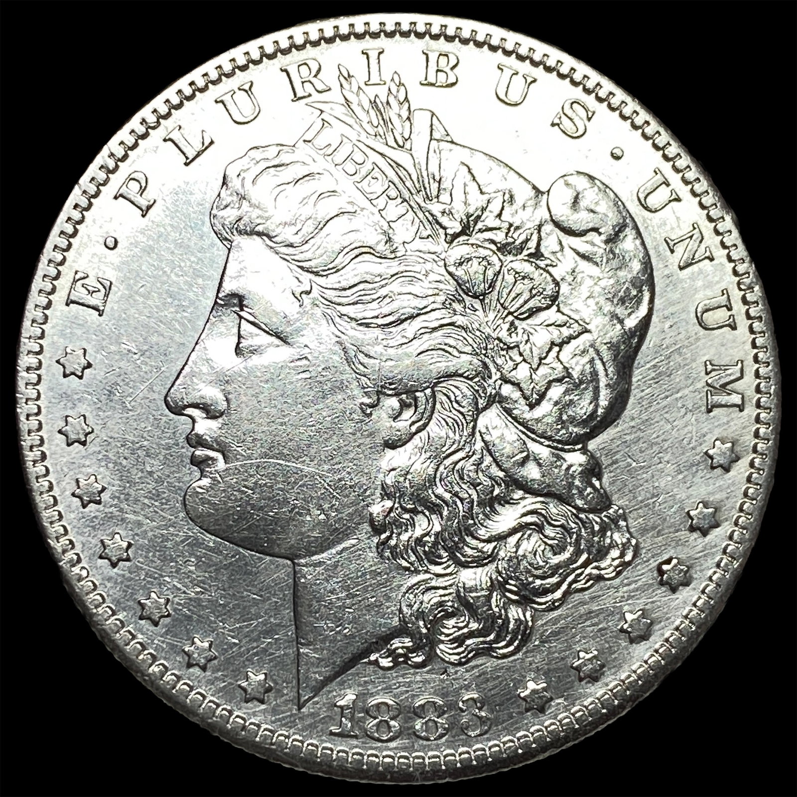 1883-S Silver Morgan Dollar ABOUT UNCIRCULATED: 1883-S Silver Morgan Dollar ABOUT UNCIRCULATED