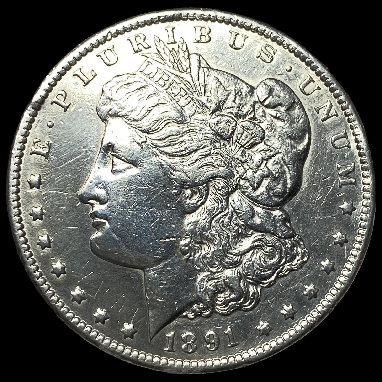 1891-CC Silver Morgan Dollar CLOSELY UNCIRCULATED: 1891-CC Silver Morgan Dollar CLOSELY UNCIRCULATED