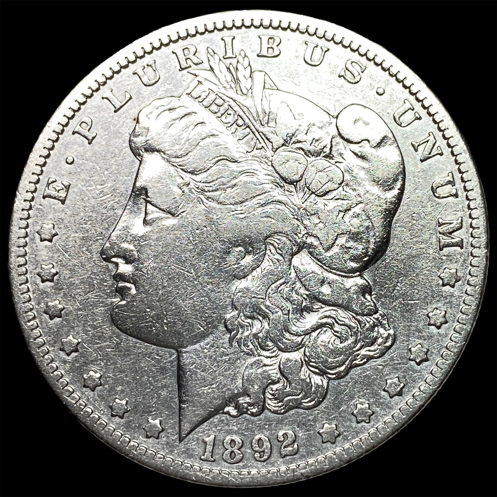 1892-CC Silver Morgan Dollar ABOUT UNCIRCULATED: 1892-CC Silver Morgan Dollar ABOUT UNCIRCULATED