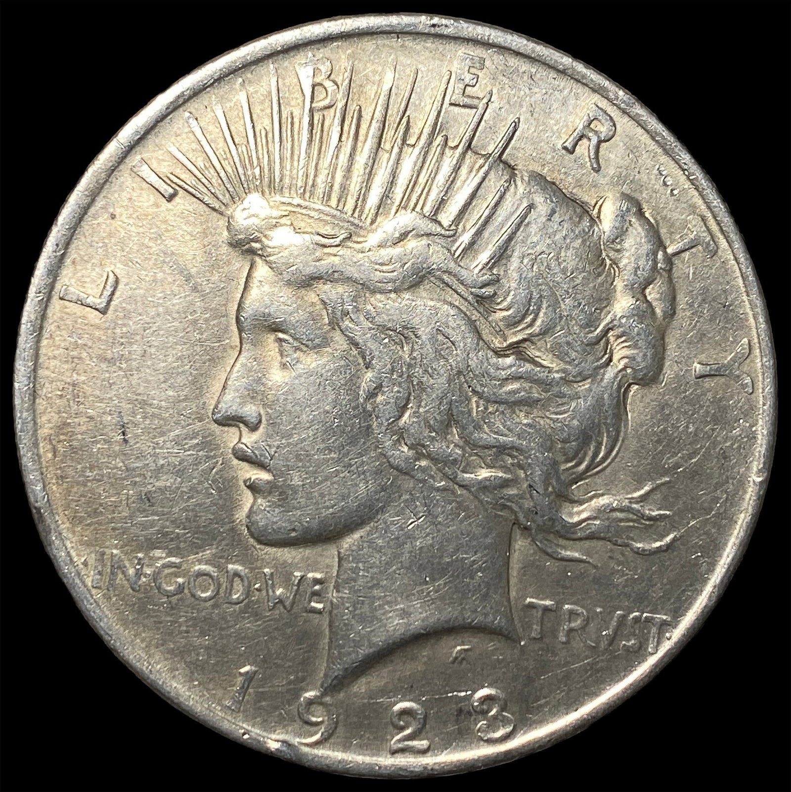 1923 Silver Peace Dollar CLOSELY UNCIRCULATED (1 of 2)