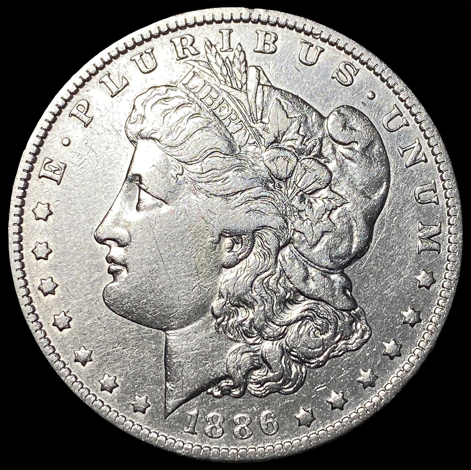 1886-O Silver Morgan Dollar CLOSELY UNCIRCULATED: 1886-O Silver Morgan Dollar CLOSELY UNCIRCULATED