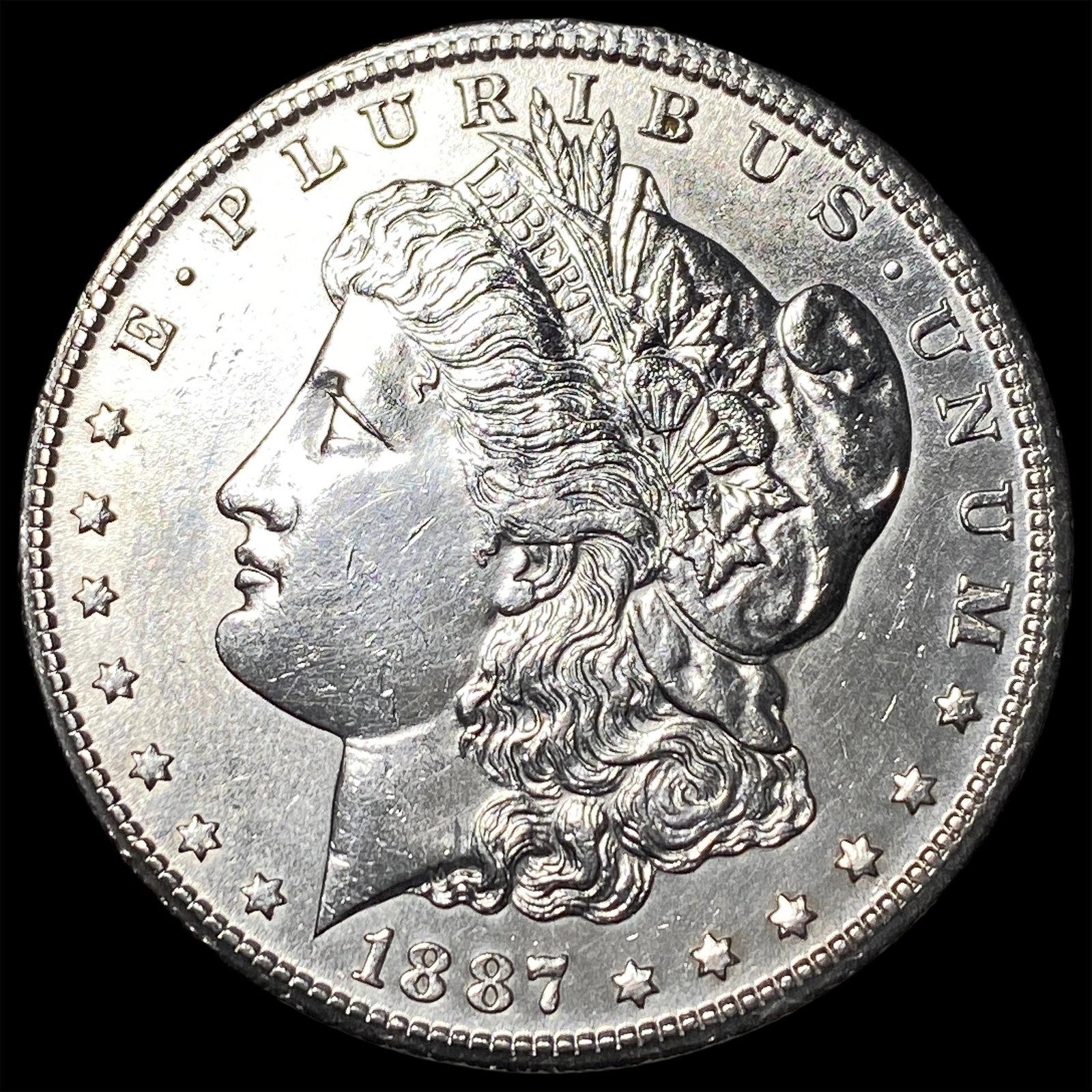 1887-S Silver Morgan Dollar ABOUT UNCIRCULATED: 1887-S Silver Morgan Dollar ABOUT UNCIRCULATED