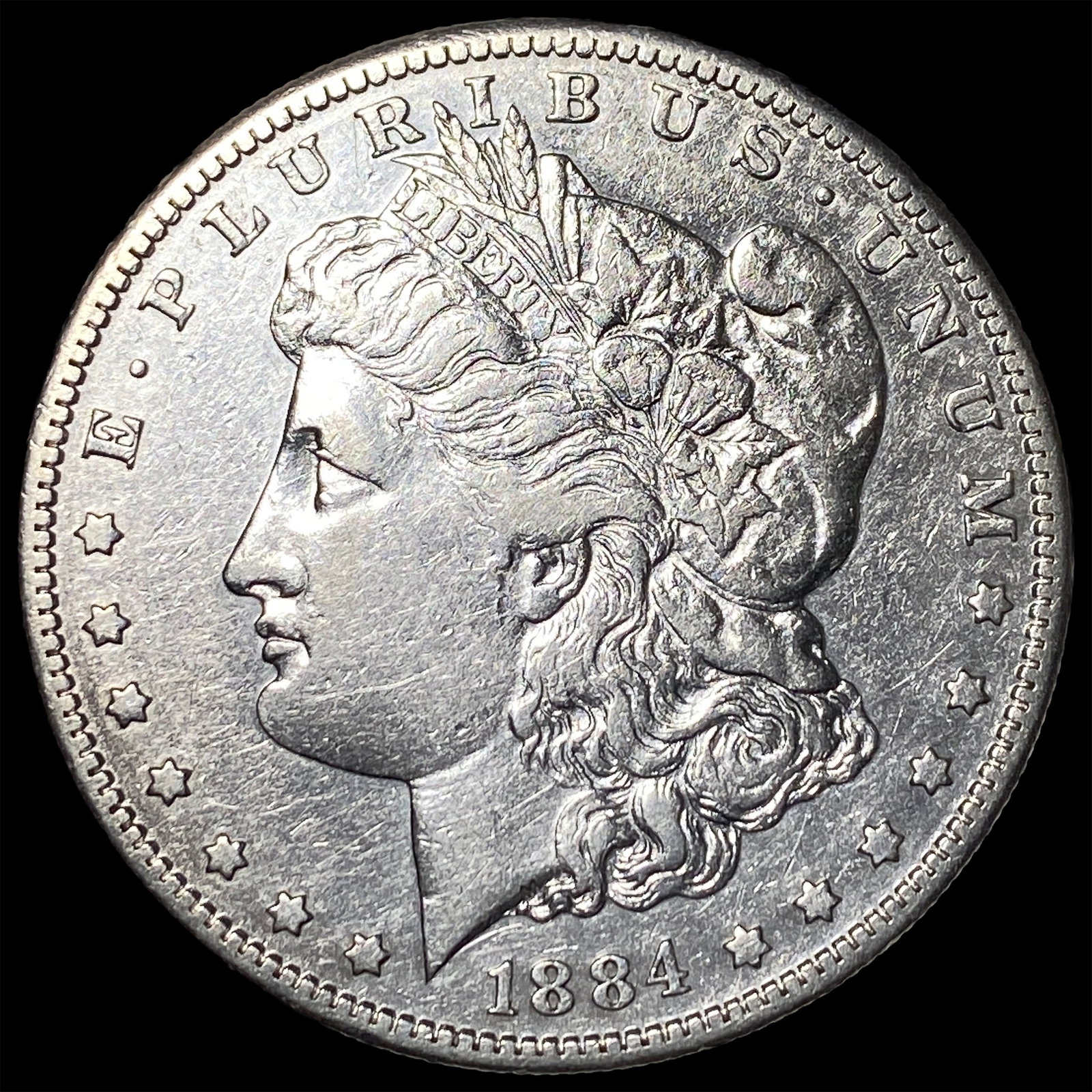 1884-S Silver Morgan Dollar ABOUT UNCIRCULATED: 1884-S Silver Morgan Dollar ABOUT UNCIRCULATED