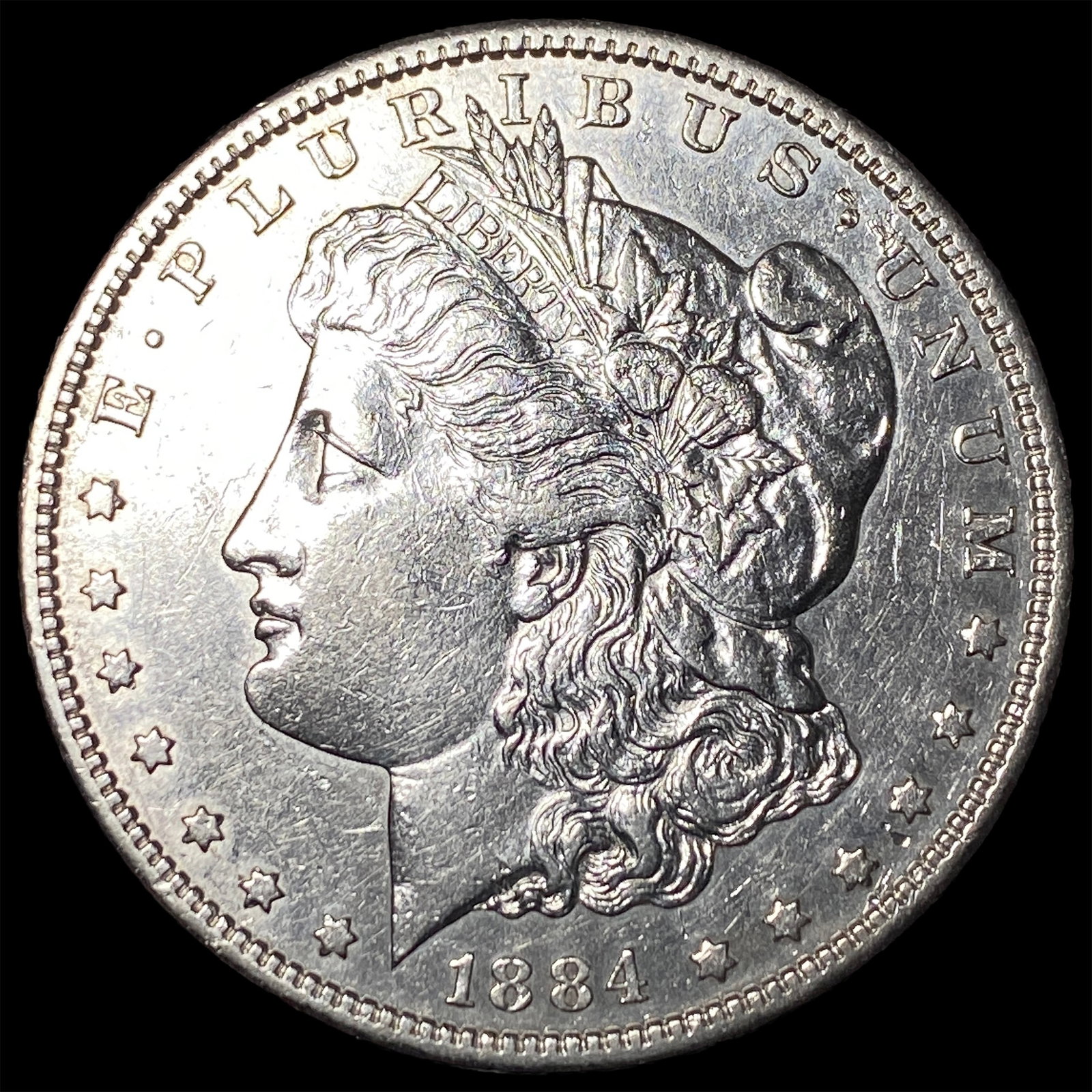 1884-S Silver Morgan Dollar ABOUT UNCIRCULATED: 1884-S Silver Morgan Dollar ABOUT UNCIRCULATED