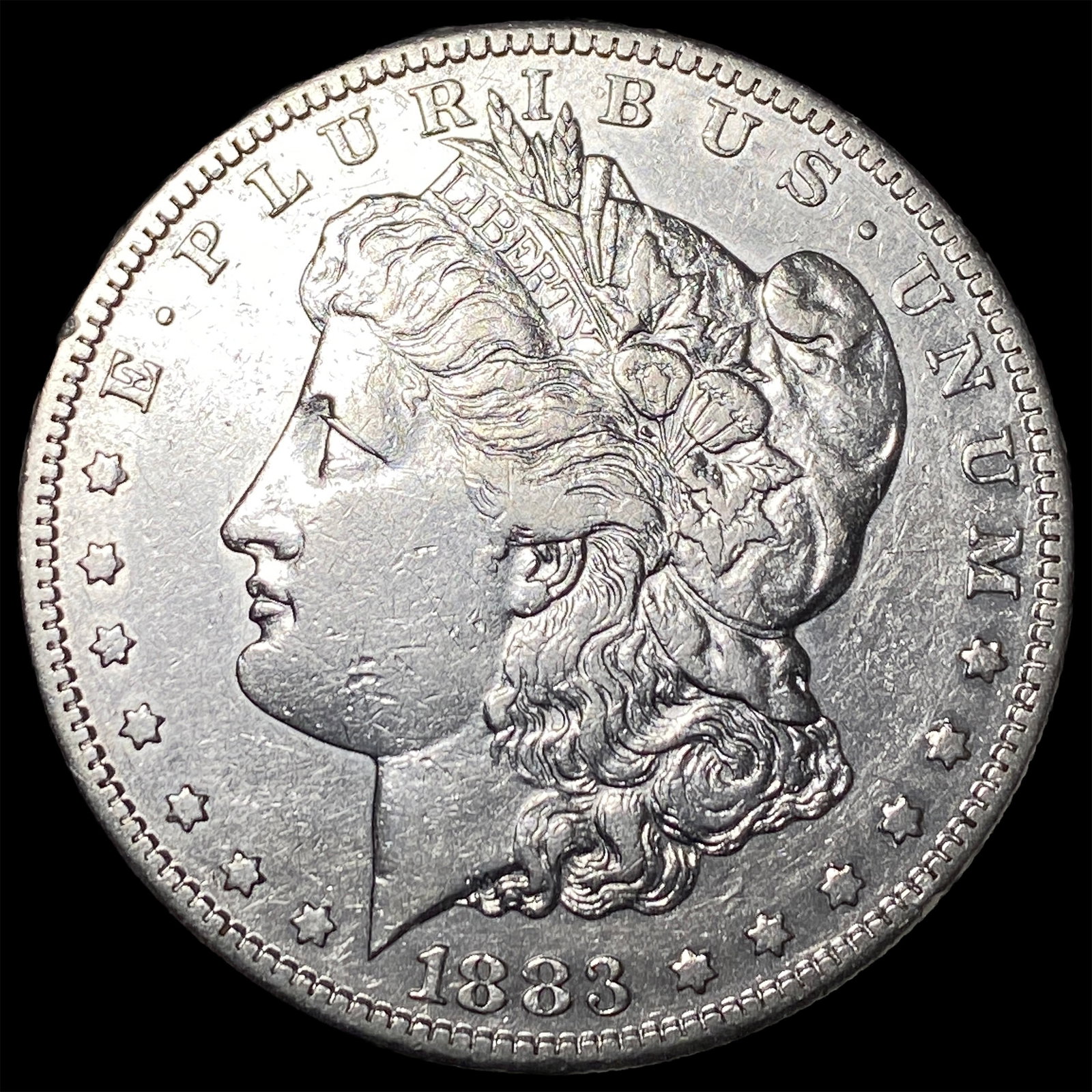 1883-S Silver Morgan Dollar ABOUT UNCIRCULATED: 1883-S Silver Morgan Dollar ABOUT UNCIRCULATED