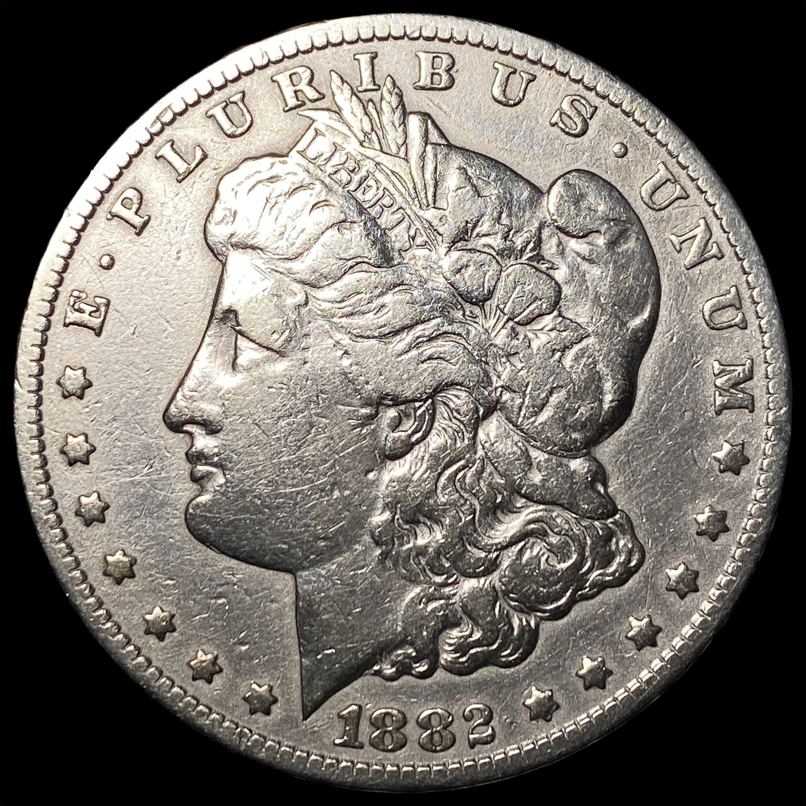 1882-CC Silver Morgan Dollar ABOUT UNCIRCULATED: 1882-CC Silver Morgan Dollar ABOUT UNCIRCULATED