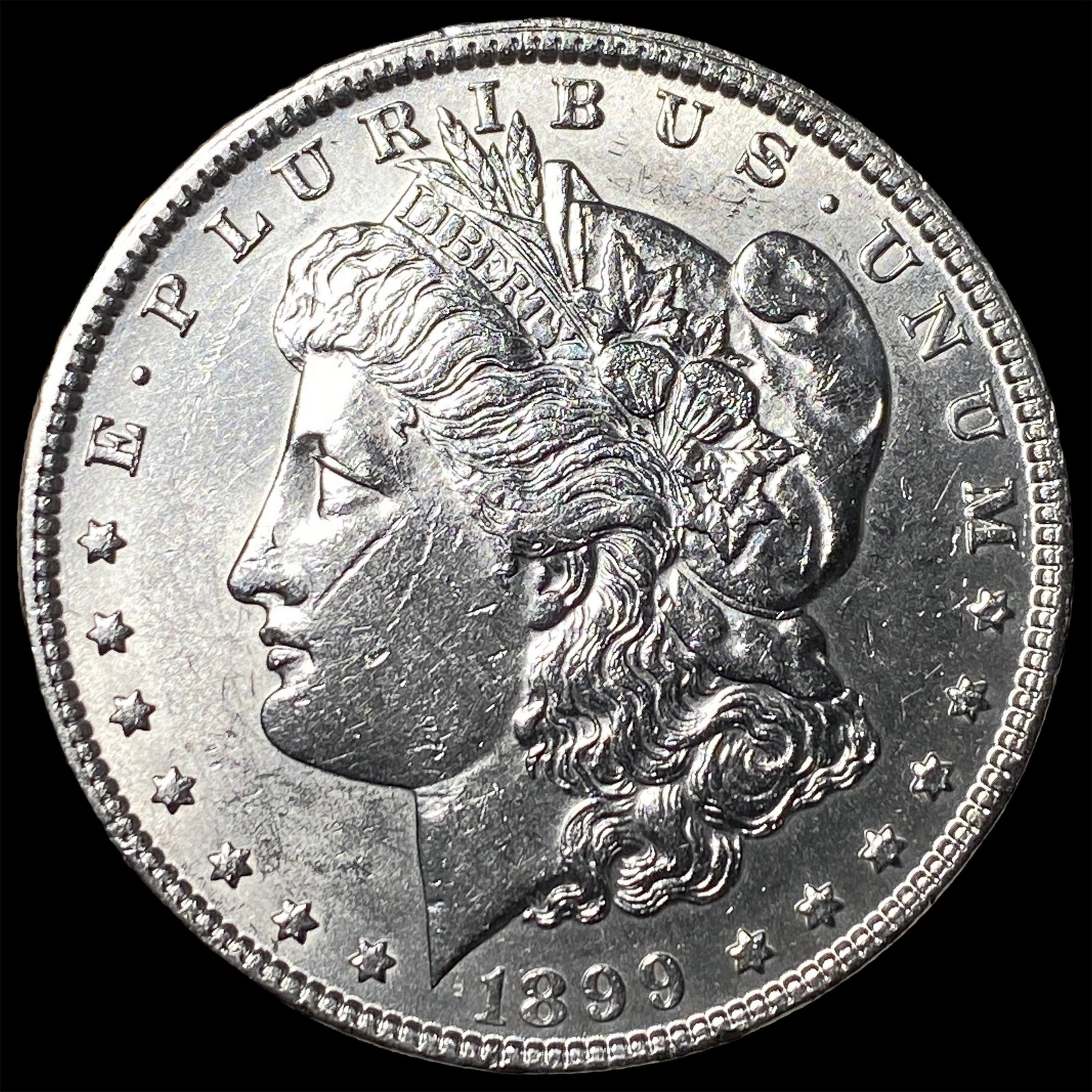 1899 Morgan Silver Dollar CLOSELY UNCIRCULATED (1 of 2)