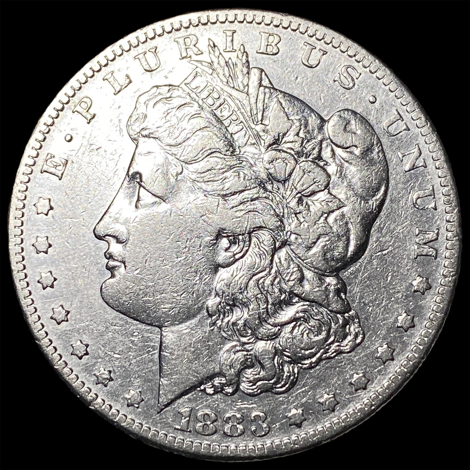 1883-O Silver Morgan Dollar CLOSELY UNCIRCULATED (1 of 2)