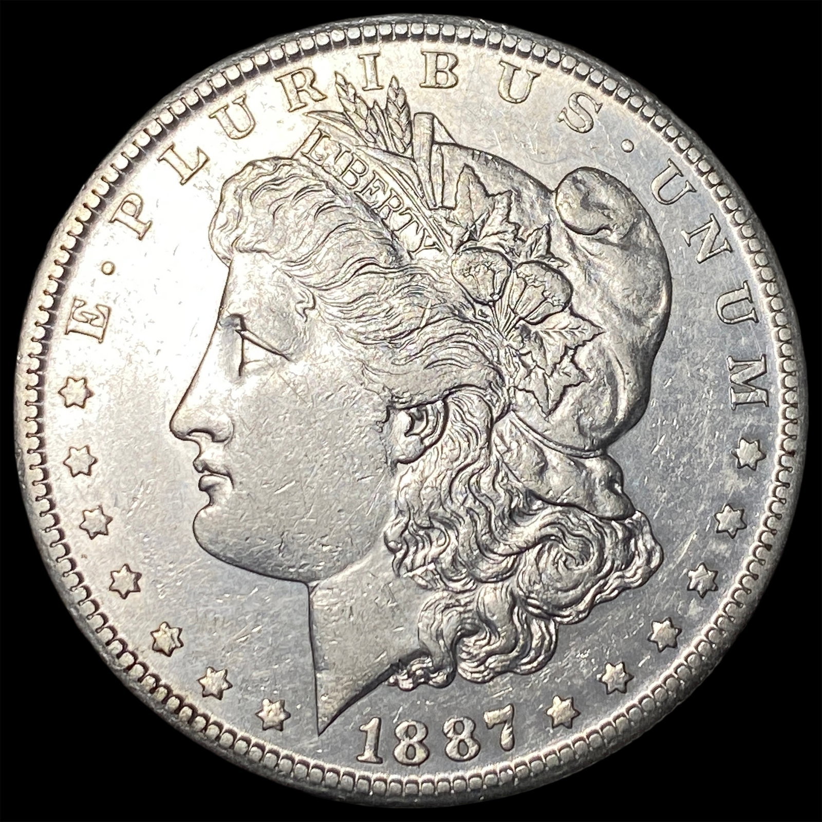1887-S Silver Morgan Dollar ABOUT UNCIRCULATED: 1887-S Silver Morgan Dollar ABOUT UNCIRCULATED