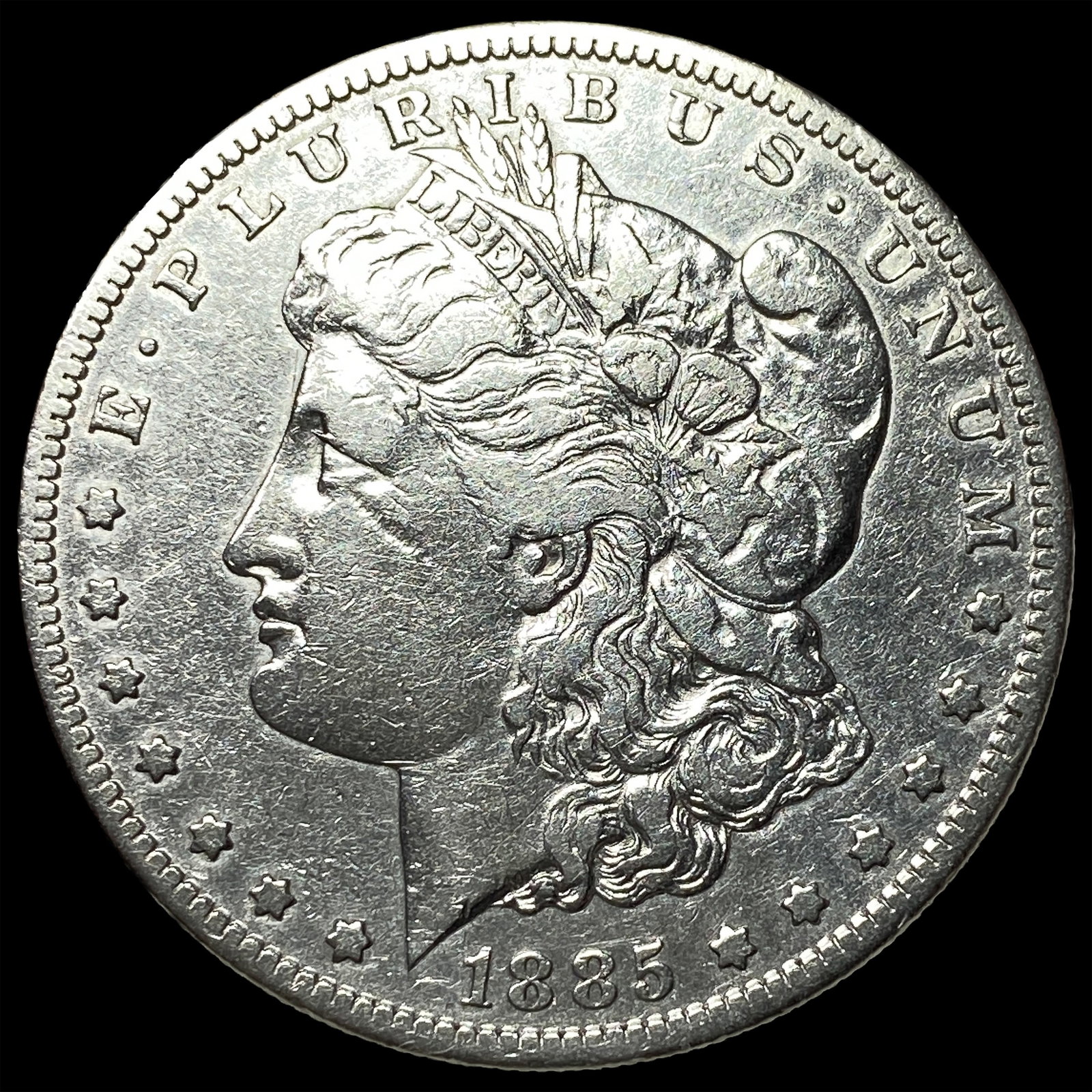 1885-O Silver Morgan Dollar CLOSELY UNCIRCULATED (1 of 2)