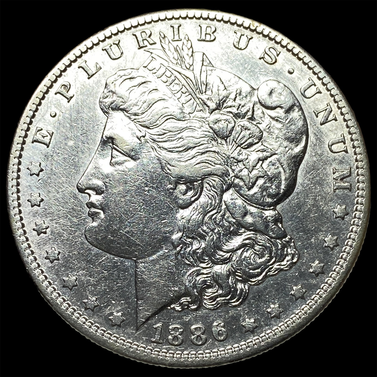 1886 Silver Morgan Dollar CLOSELY UNCIRCULATED: 1886 Silver Morgan Dollar CLOSELY UNCIRCULATED