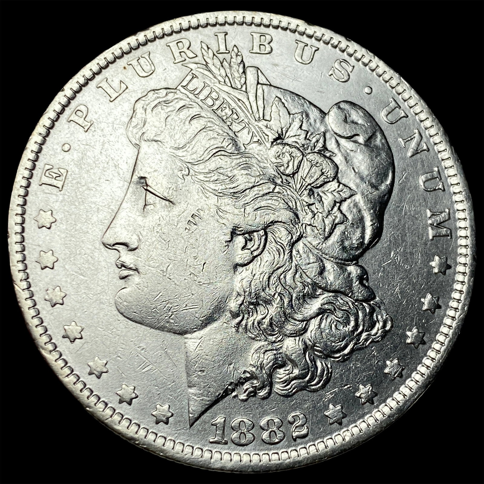 1882-O/S Morgan Silver Dollar CLOSELY UNCIRCULATED (1 of 2)