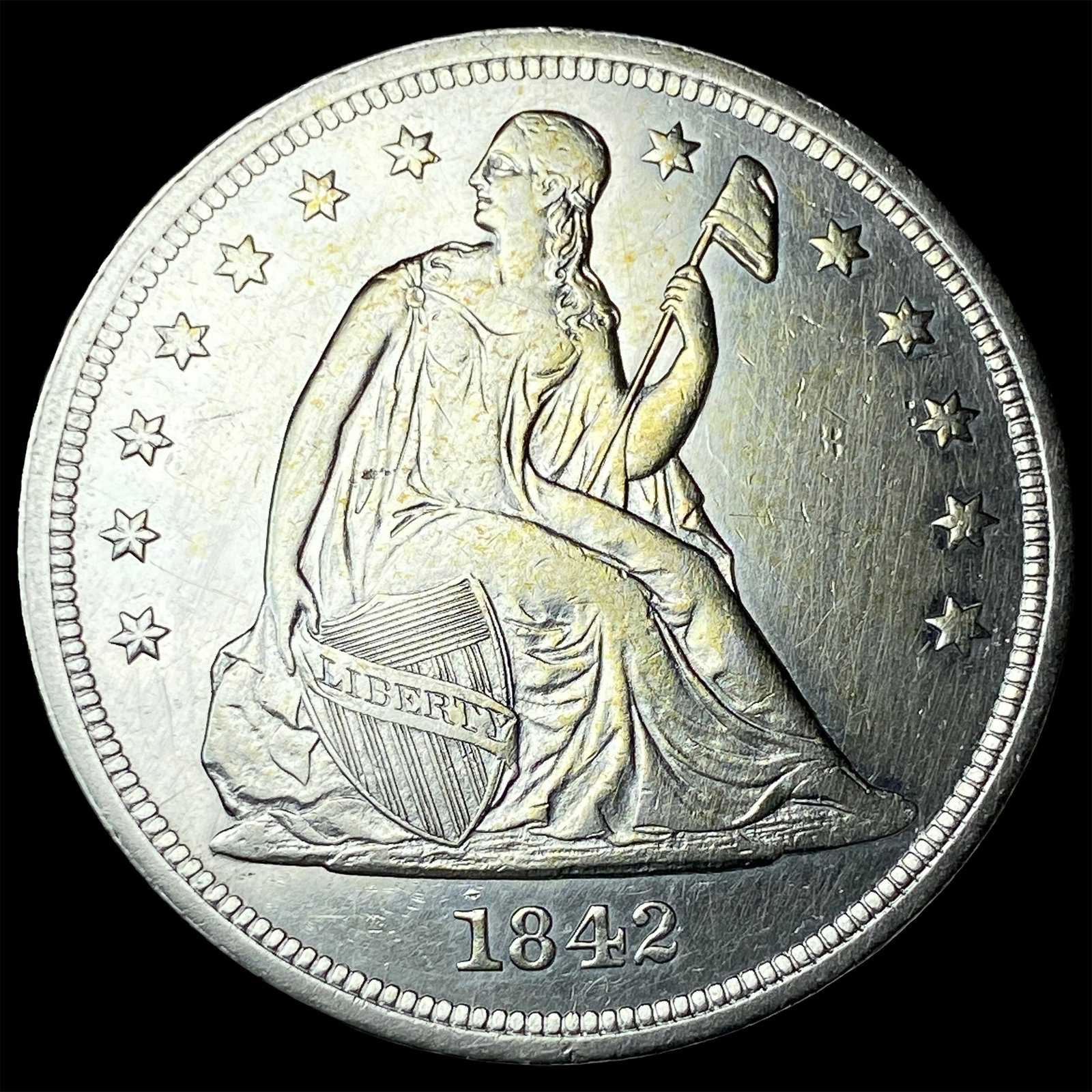 1842 Silver Seated Liberty Dollar CLOSELY UNCIRCULATED: 1842 Silver Seated Liberty Dollar CLOSELY UNCIRCULATED