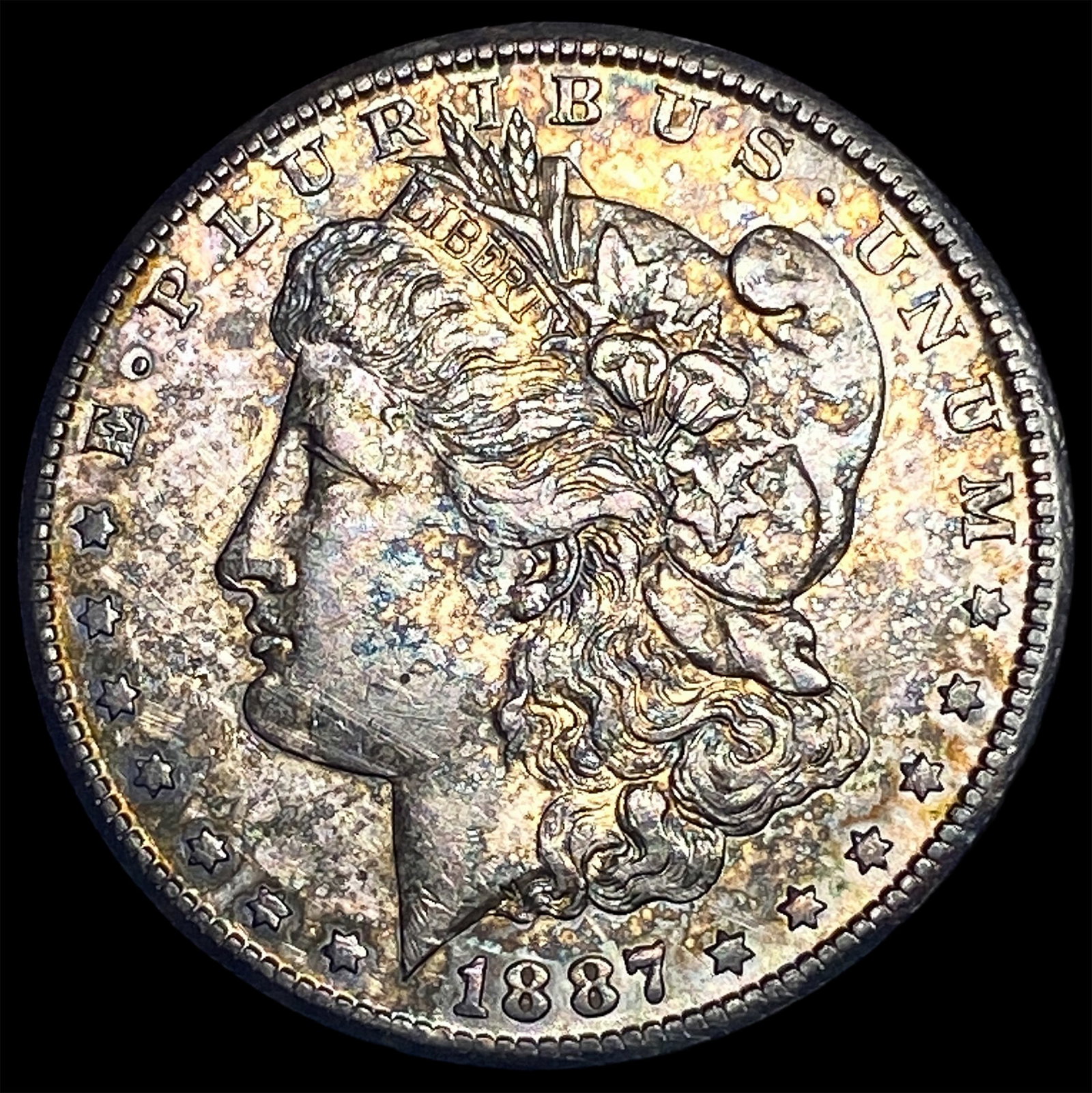 1887 Morgan Silver Dollar CLOSELY UNCIRCULATED (1 of 2)