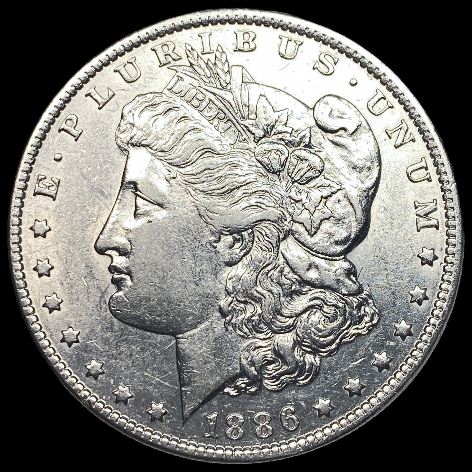 1886-O Silver Morgan Dollar CLOSELY UNCIRCULATED: 1886-O Silver Morgan Dollar CLOSELY UNCIRCULATED