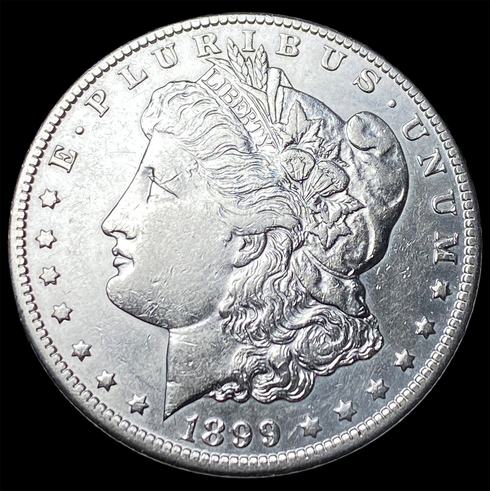 1899-O Micro O Morgan Silver Dollar CLOSELY UNCIRCULATED: 1899-O Micro O Morgan Silver Dollar CLOSELY UNCIRCULATED