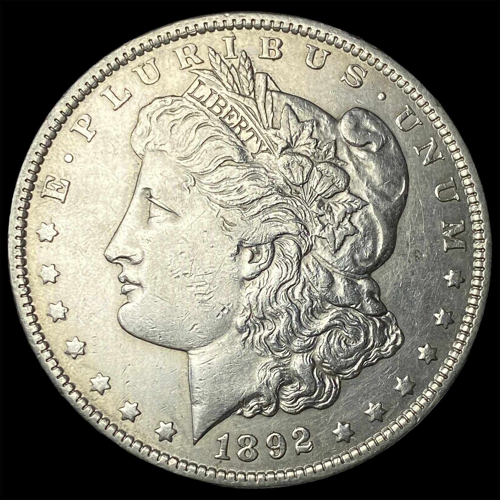 1892 Silver Morgan Dollar CLOSELY UNCIRCULATED (1 of 2)