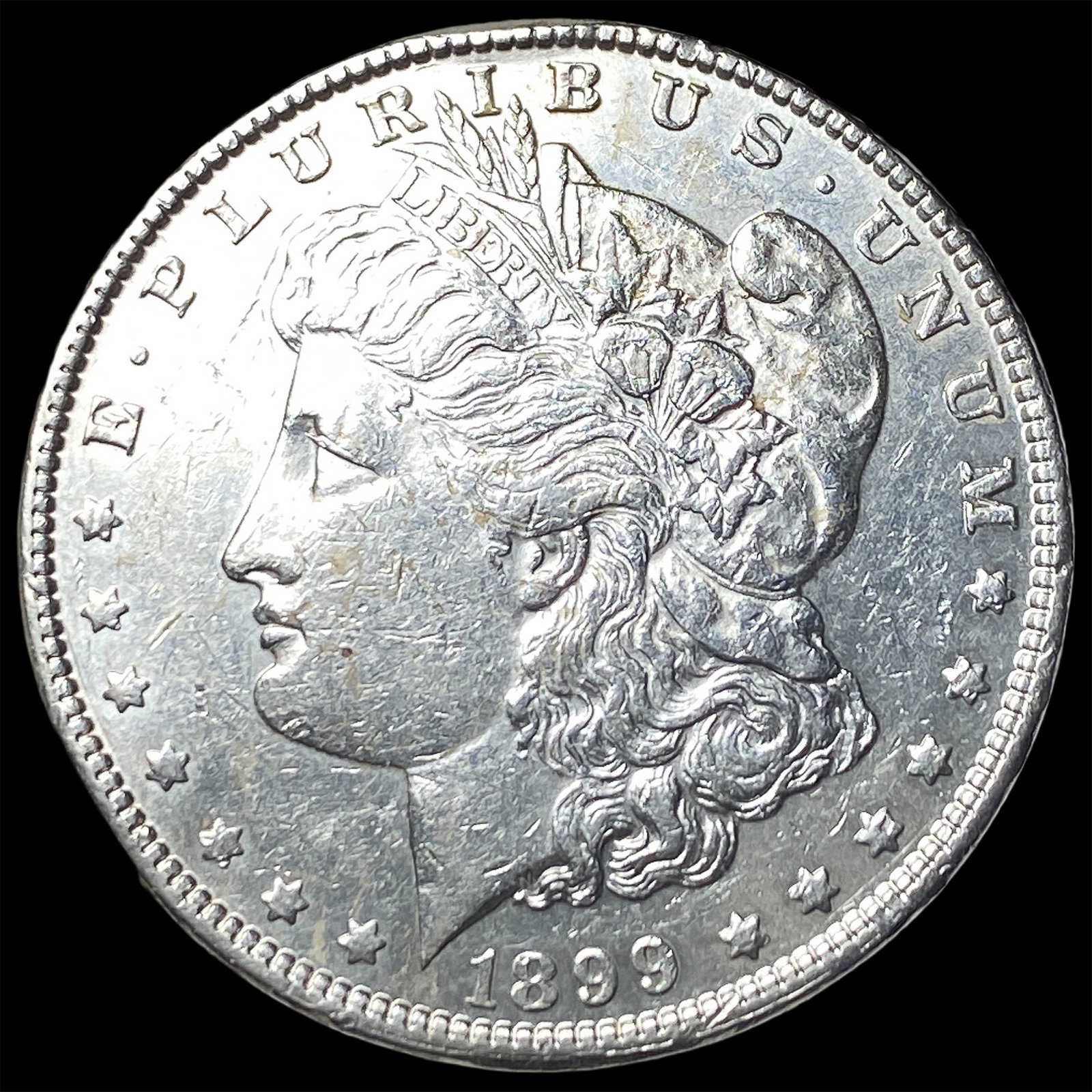1899 Morgan Silver Dollar CLOSELY UNCIRCULATED: 1899 Morgan Silver Dollar CLOSELY UNCIRCULATED