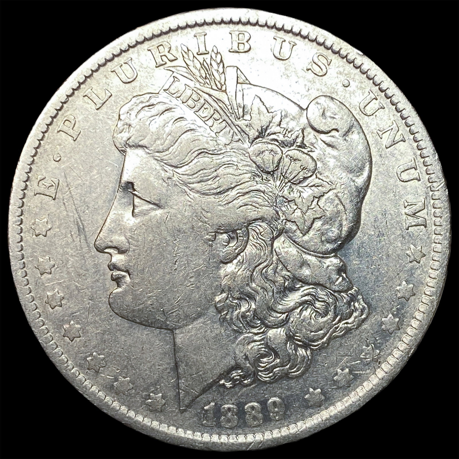 1889-O Morgan Silver Dollar NEARLY UNCIRCULATED: 1889-O Morgan Silver Dollar NEARLY UNCIRCULATED