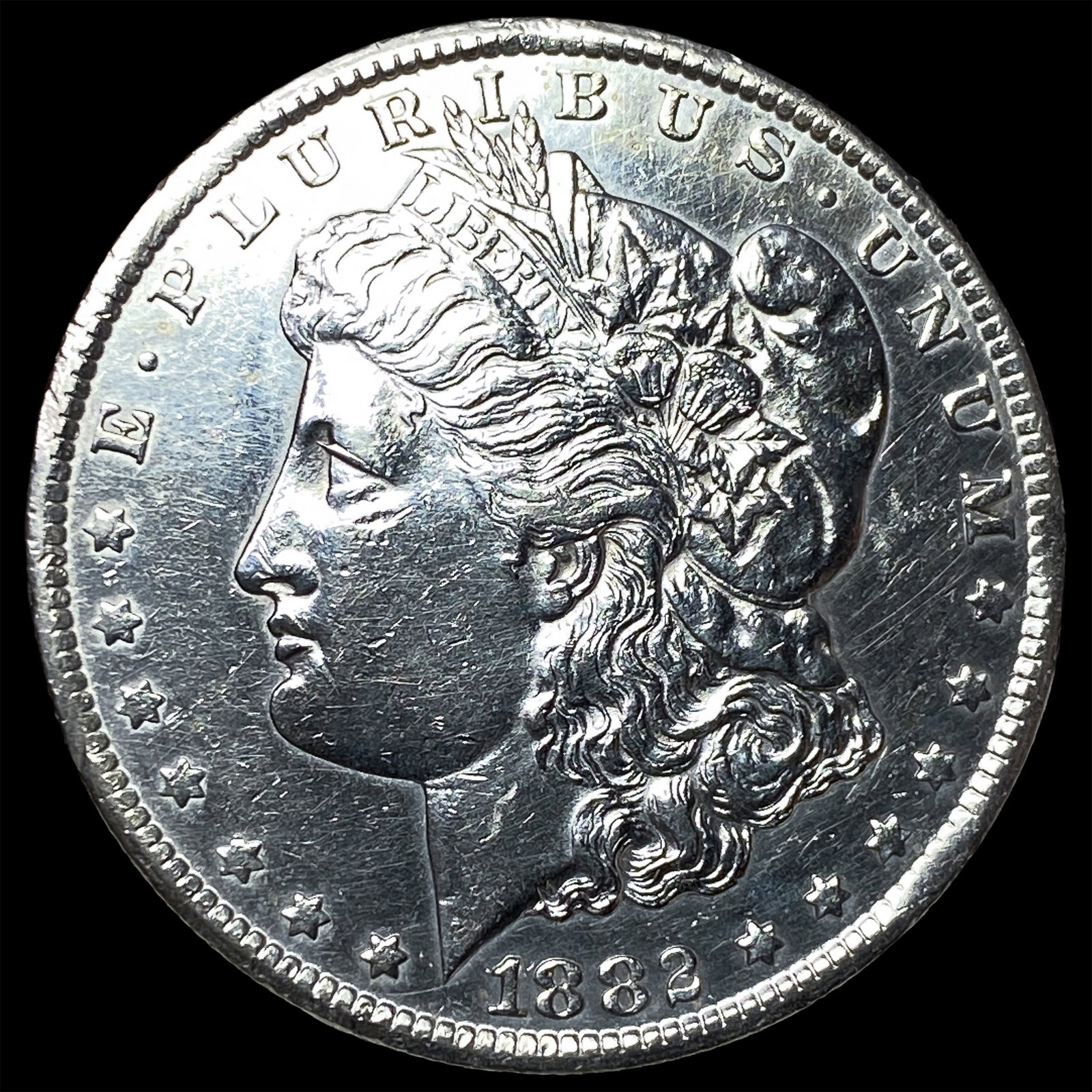 1882-CC Silver Morgan Dollar CLOSELY UNCIRCULATED: 1882-CC Silver Morgan Dollar CLOSELY UNCIRCULATED